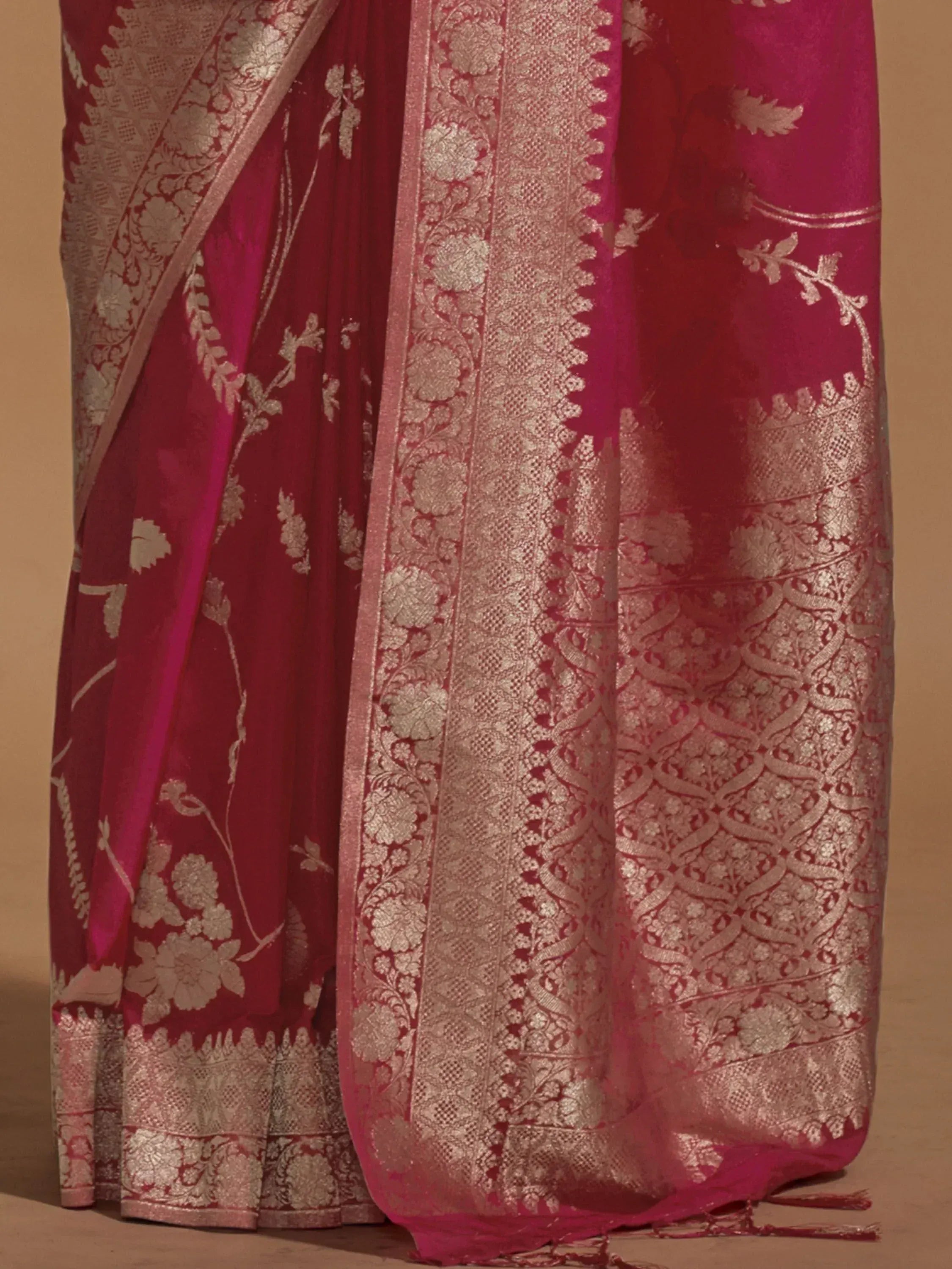 Rich maroon saree with gold floral zari work and intricate border, ideal for Indian ethnic wear occasions