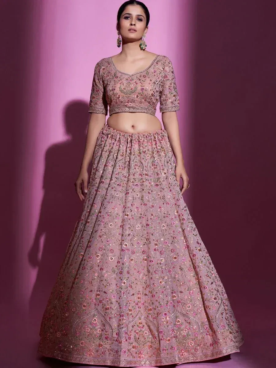 Pink floral embroidered lehenga choli with crop top, perfect for Indian weddings and festive occasions.