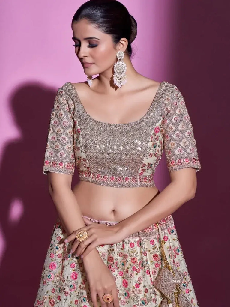 Unimaginable Cream Sequins Embroidered Soft Net Lehenga Choli