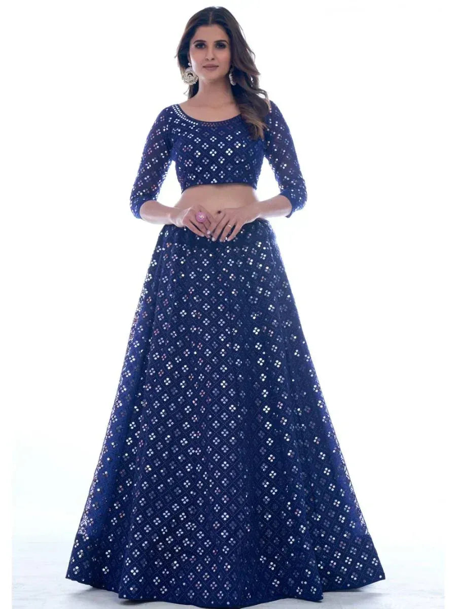 Navy blue sequin lehenga choli with sheer sleeves, perfect for Indian ethnic occasions