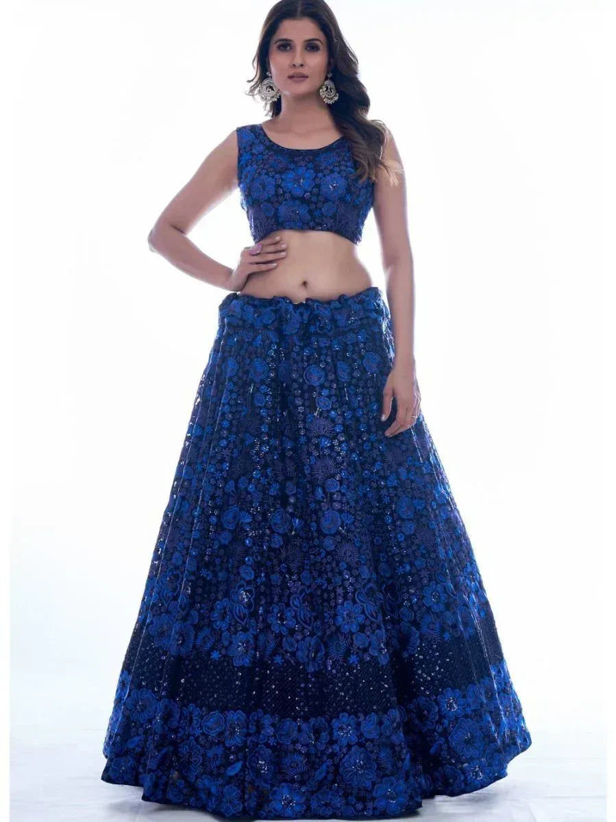 Blue floral embroidered lehenga choli with sleeveless blouse, perfect for Indian ethnic occasions