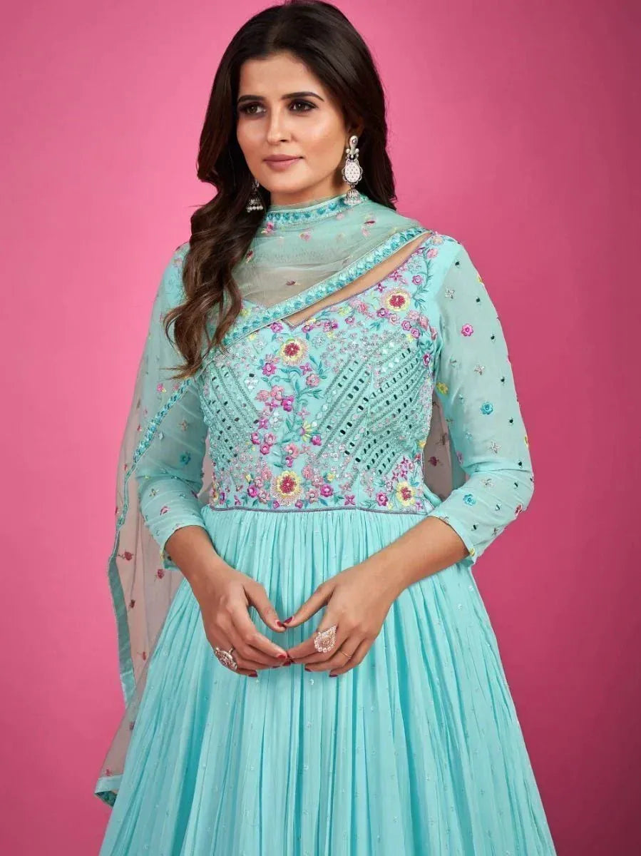 Light blue embroidered anarkali suit with floral detailing and sheer dupatta, perfect for ethnic occasions