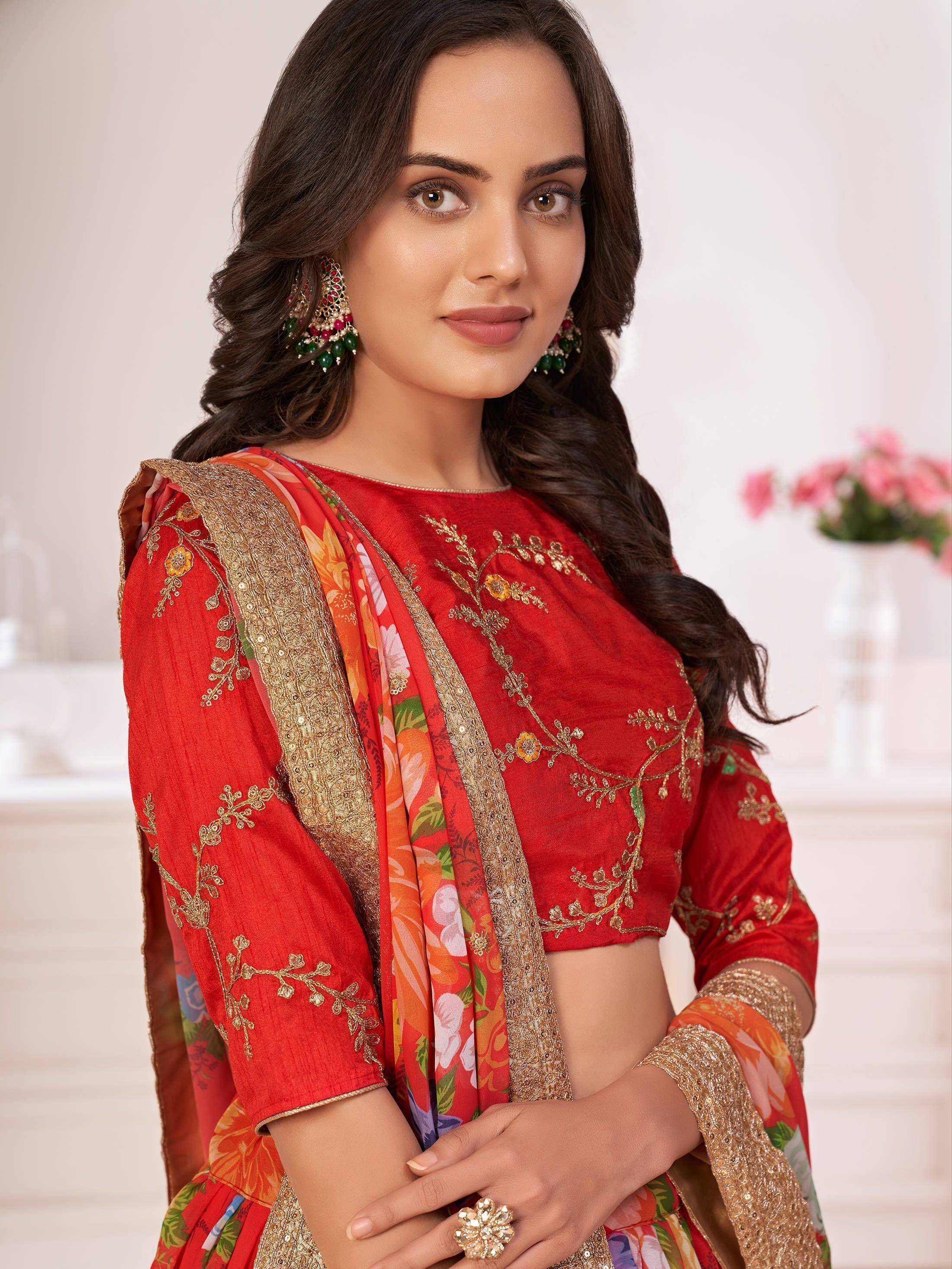 Red embroidered ethnic salwar kameez with floral dupatta and gold detailing for women