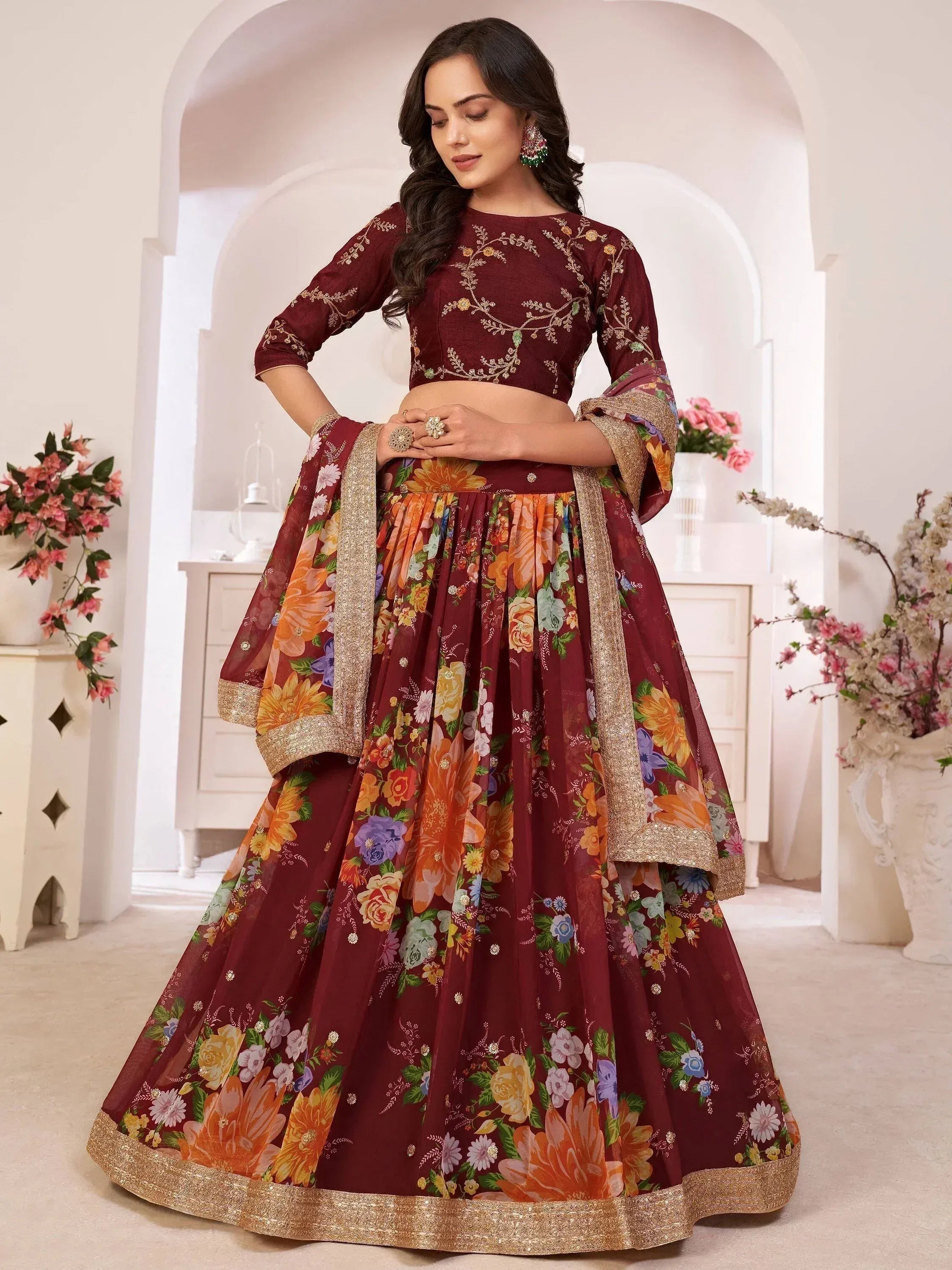 Maroon floral lehenga choli with gold embroidery, perfect for Indian weddings and festive occasions