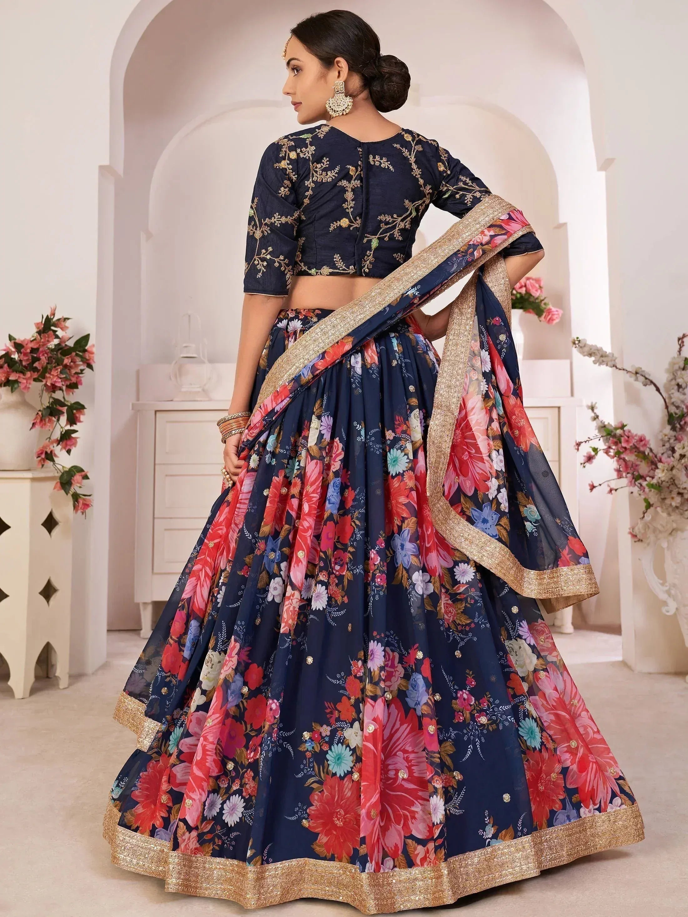 Navy blue floral lehenga choli with gold embroidery, perfect for Indian ethnic wear occasions