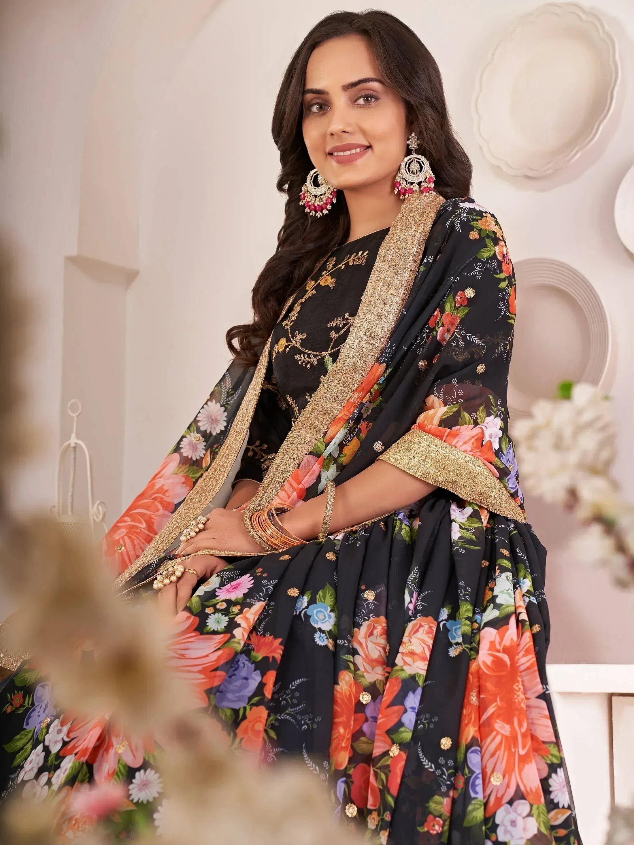 Black floral printed designer lehenga choli with gold embroidery and dupatta, ethnic Indian wear
