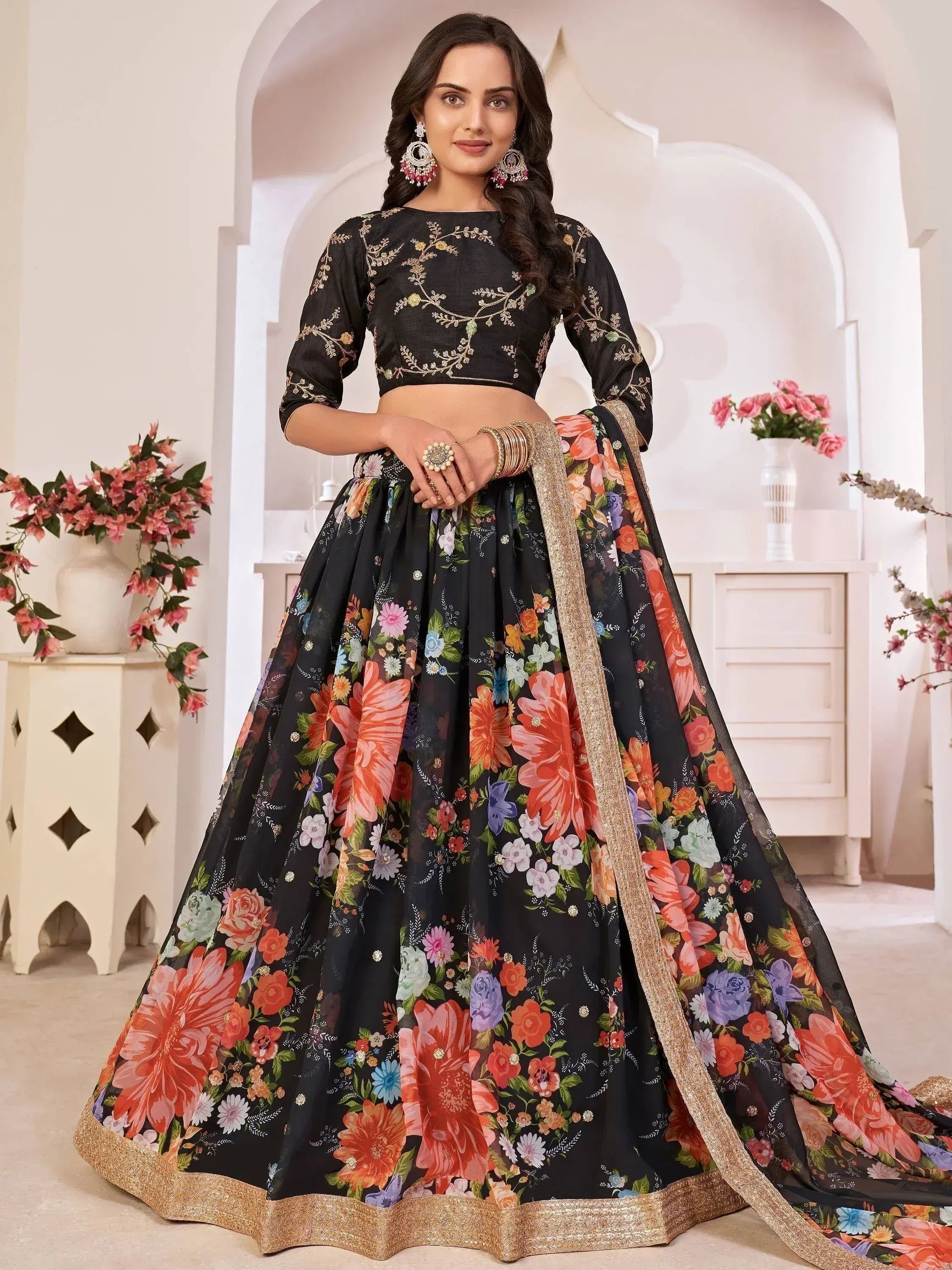 Black floral lehenga choli with gold embroidery, perfect for Indian ethnic wear occasions