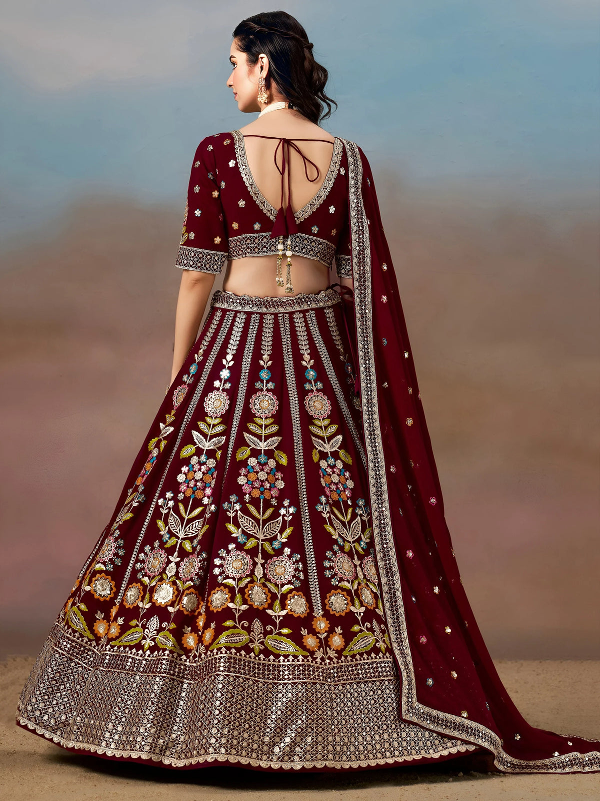Phenomenal Maroon Sequins Georgette Reception Wear Lehenga Choli