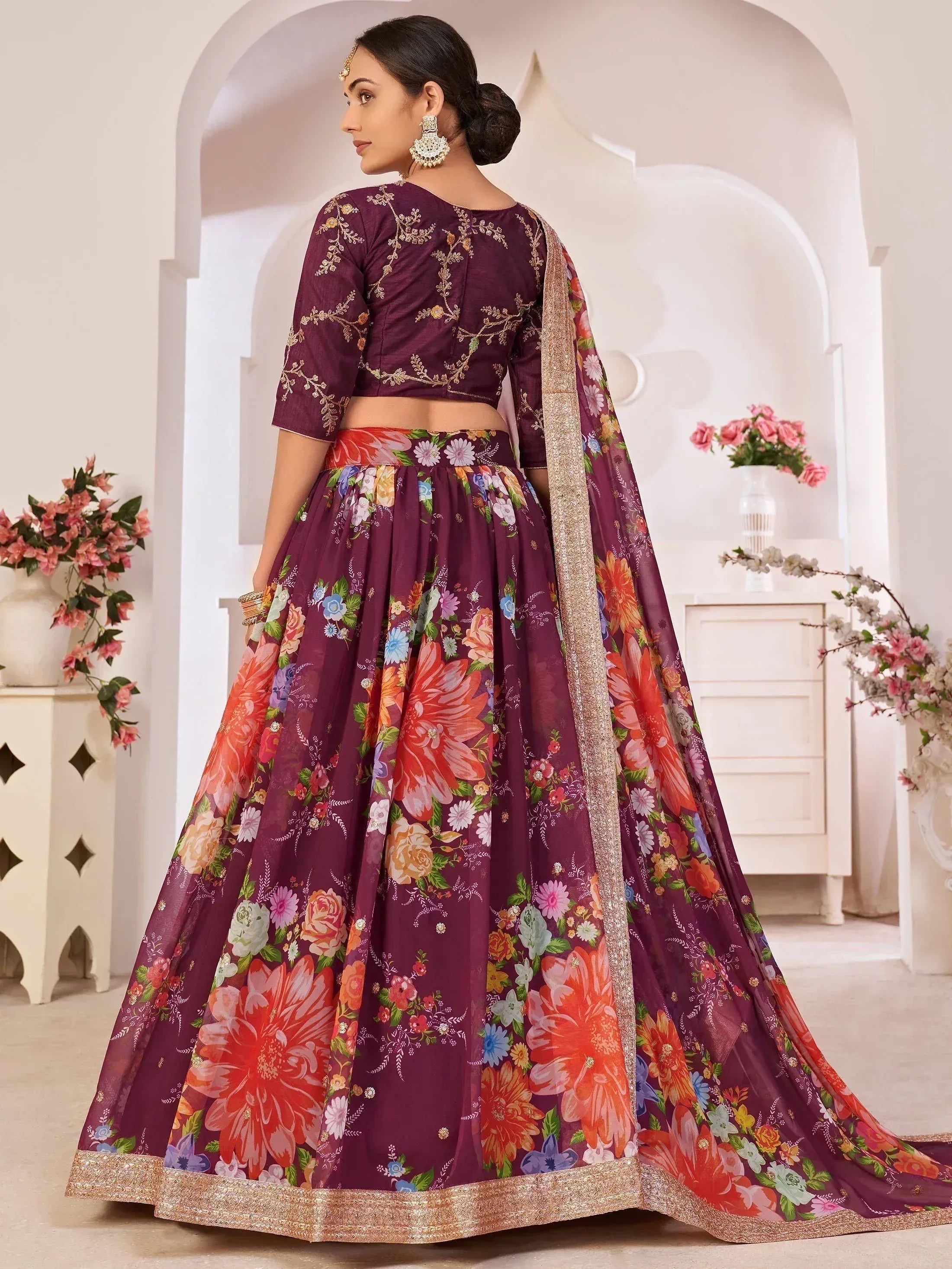 Purple floral lehenga choli with gold embroidery, perfect for Indian ethnic wear occasions