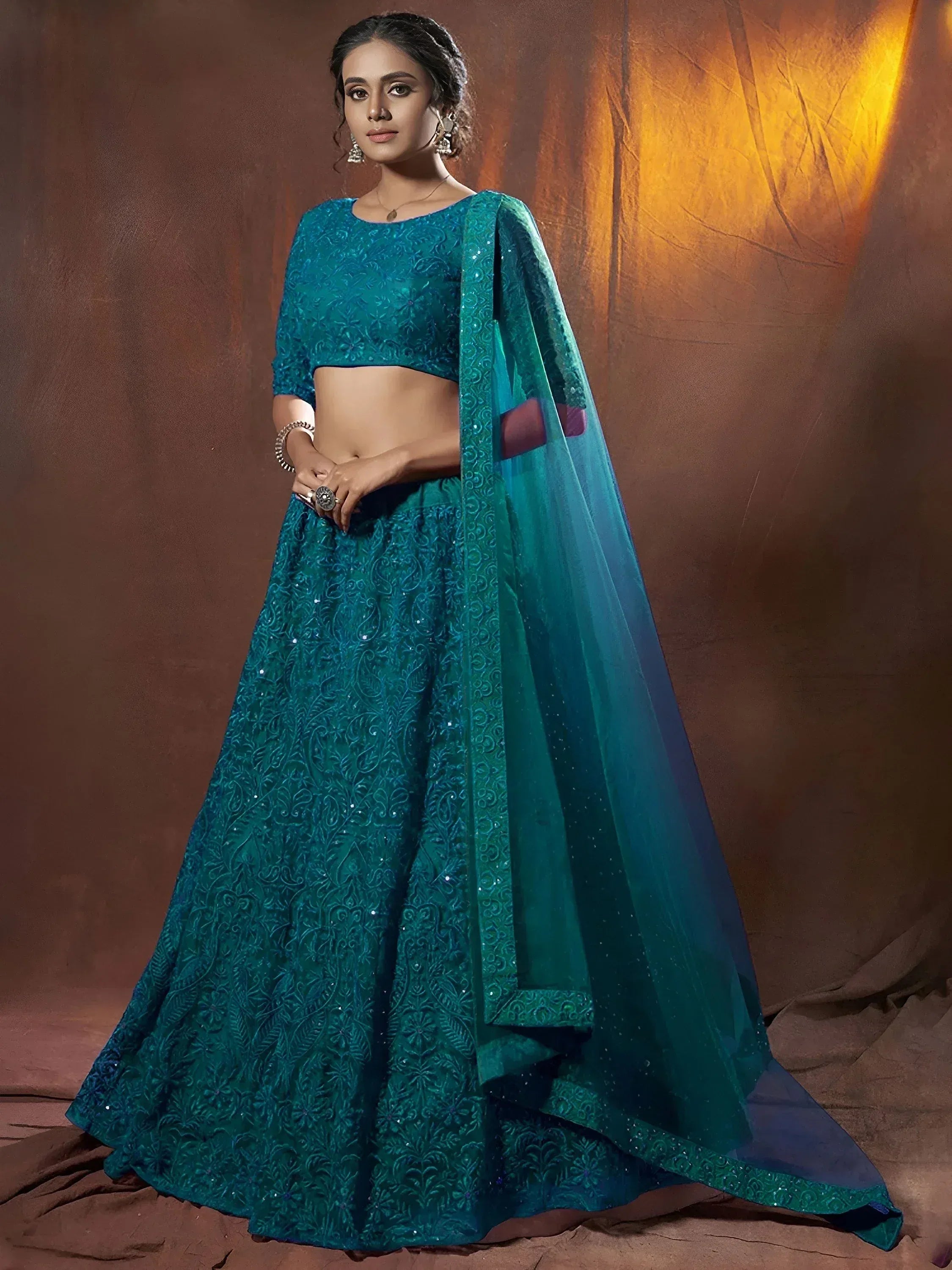 Spectacular Teal Green Sequins Net Party Wear Lehenga Choli With Dupatta
