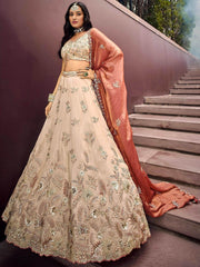 Outstanding Soft Beige Embroidered Silk Wedding Wear Lehenga Choli