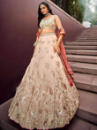 Outstanding Soft Beige Embroidered Silk Wedding Wear Lehenga Choli