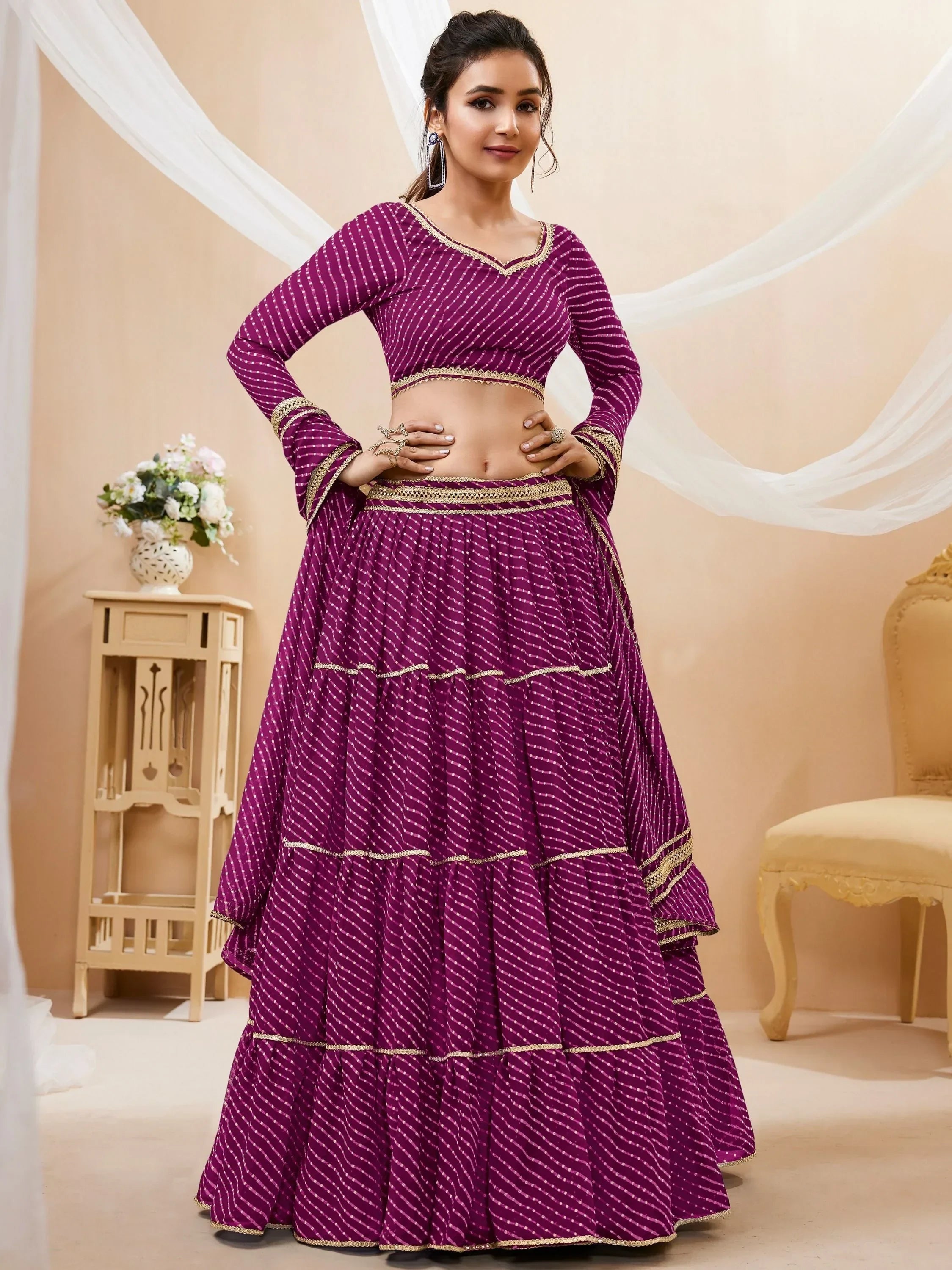 Purple printed lehenga choli with gold trim, ethnic Indian wear for women