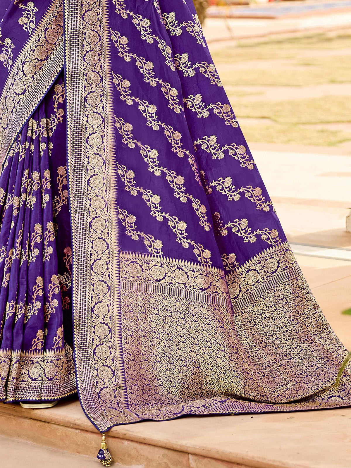 Purple designer lehenga choli with gold floral embroidery and intricate border detailing