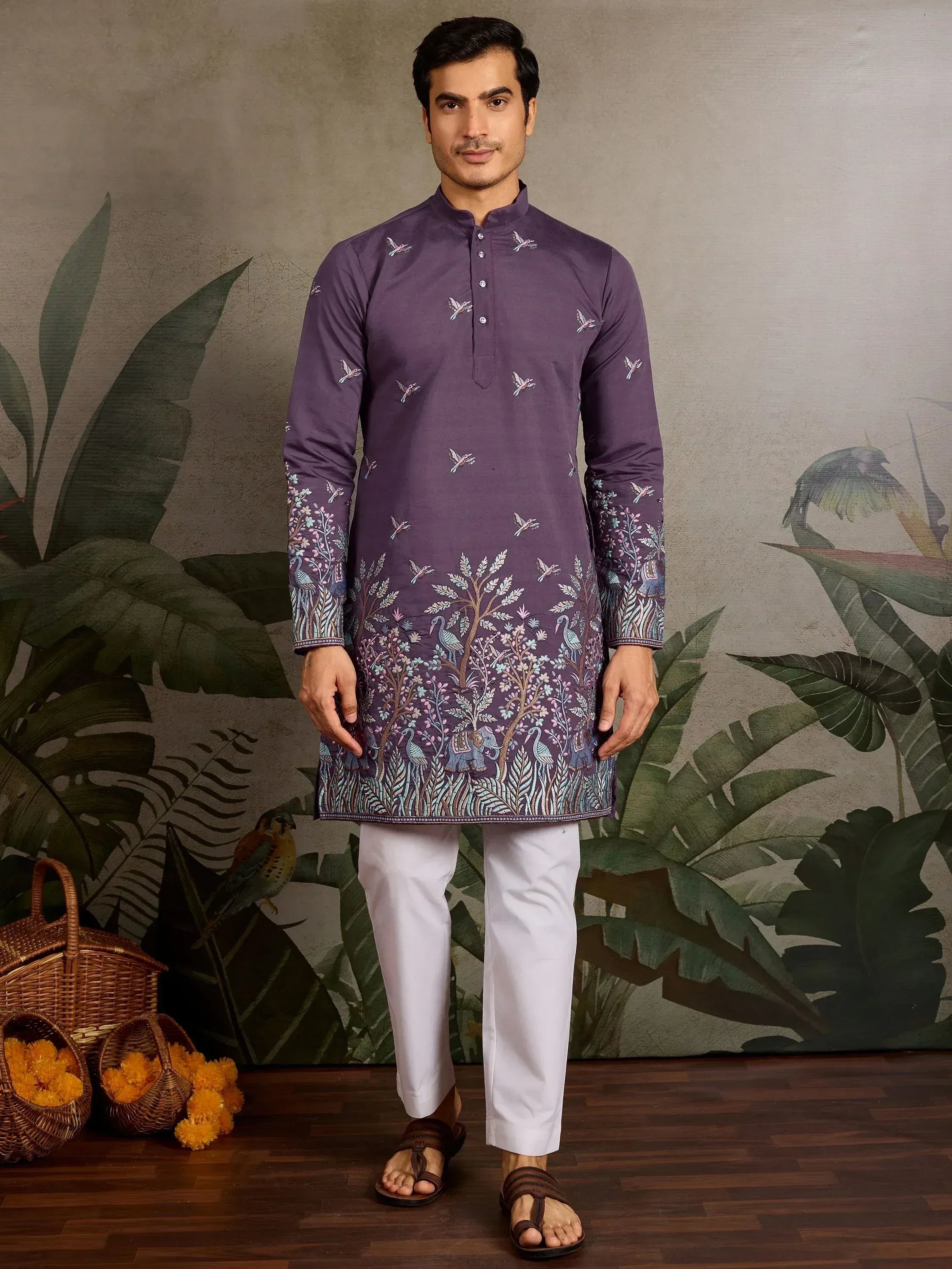 Purple embroidered kurta with bird and tree motifs, paired with white pants for ethnic wear