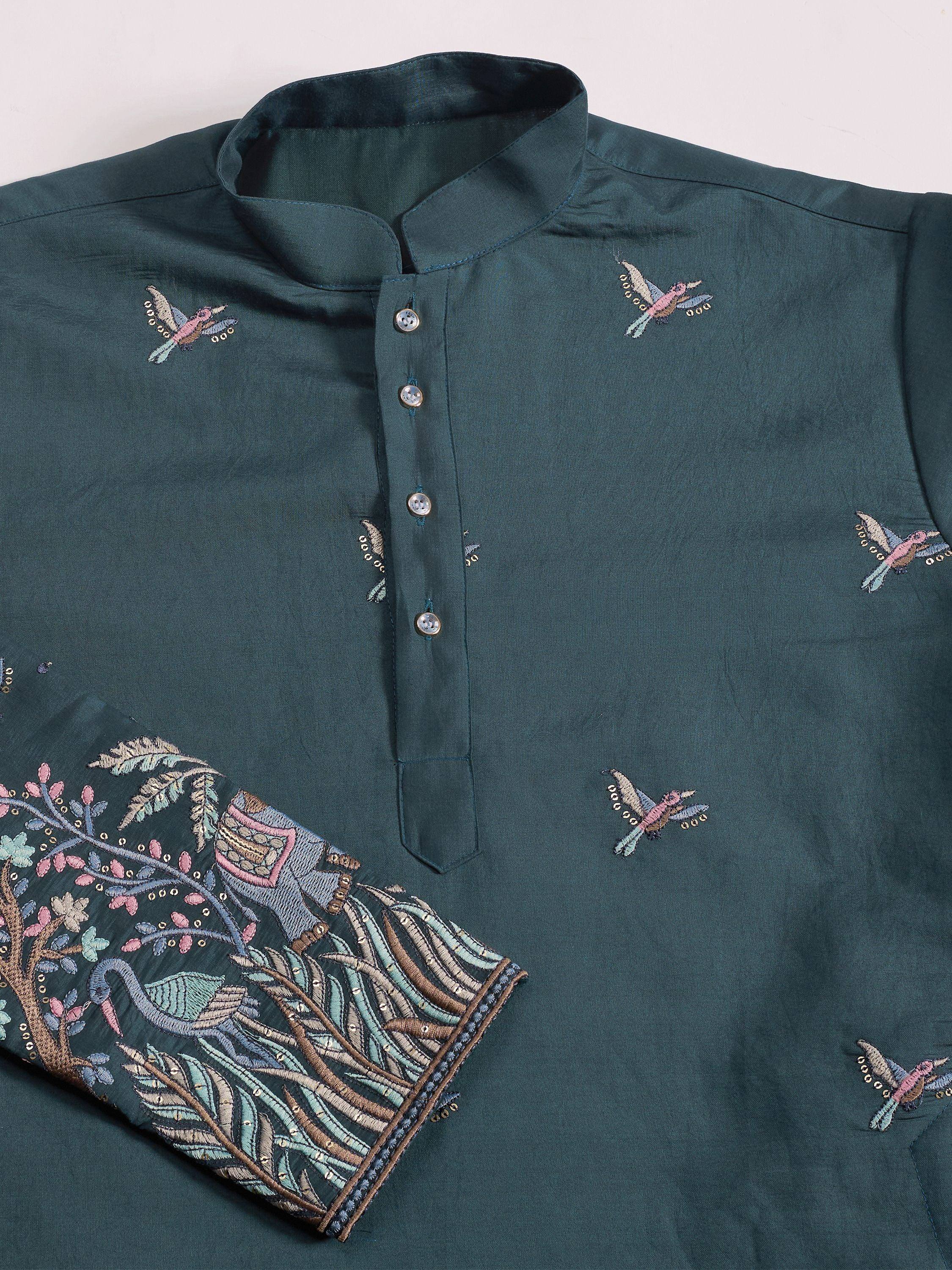 Dark green ethnic kurta with bird and floral embroidery, perfect for Indian festive wear.