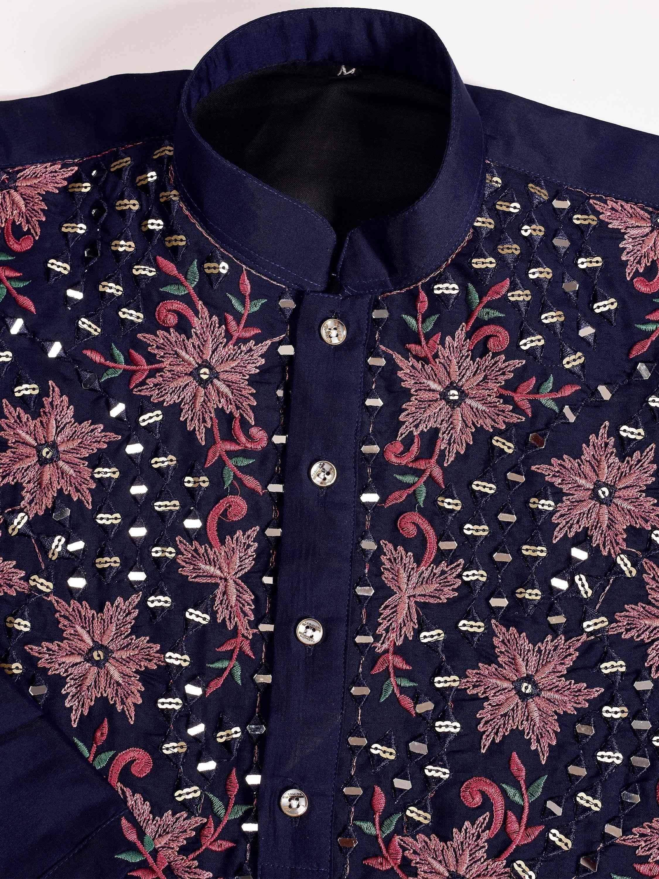 Navy blue ethnic kurta with pink floral embroidery and sequin detailing for festive occasions