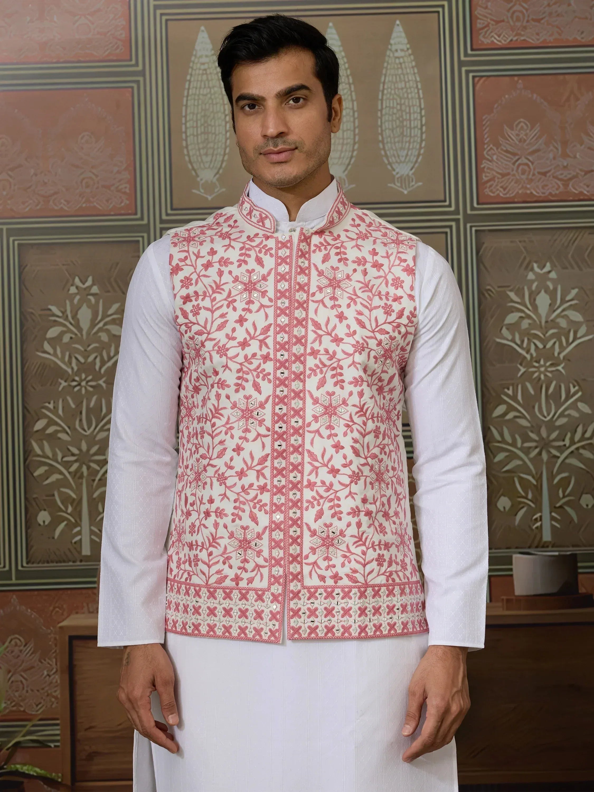 Men's white kurta with pink floral embroidered waistcoat, traditional Indian ethnic wear