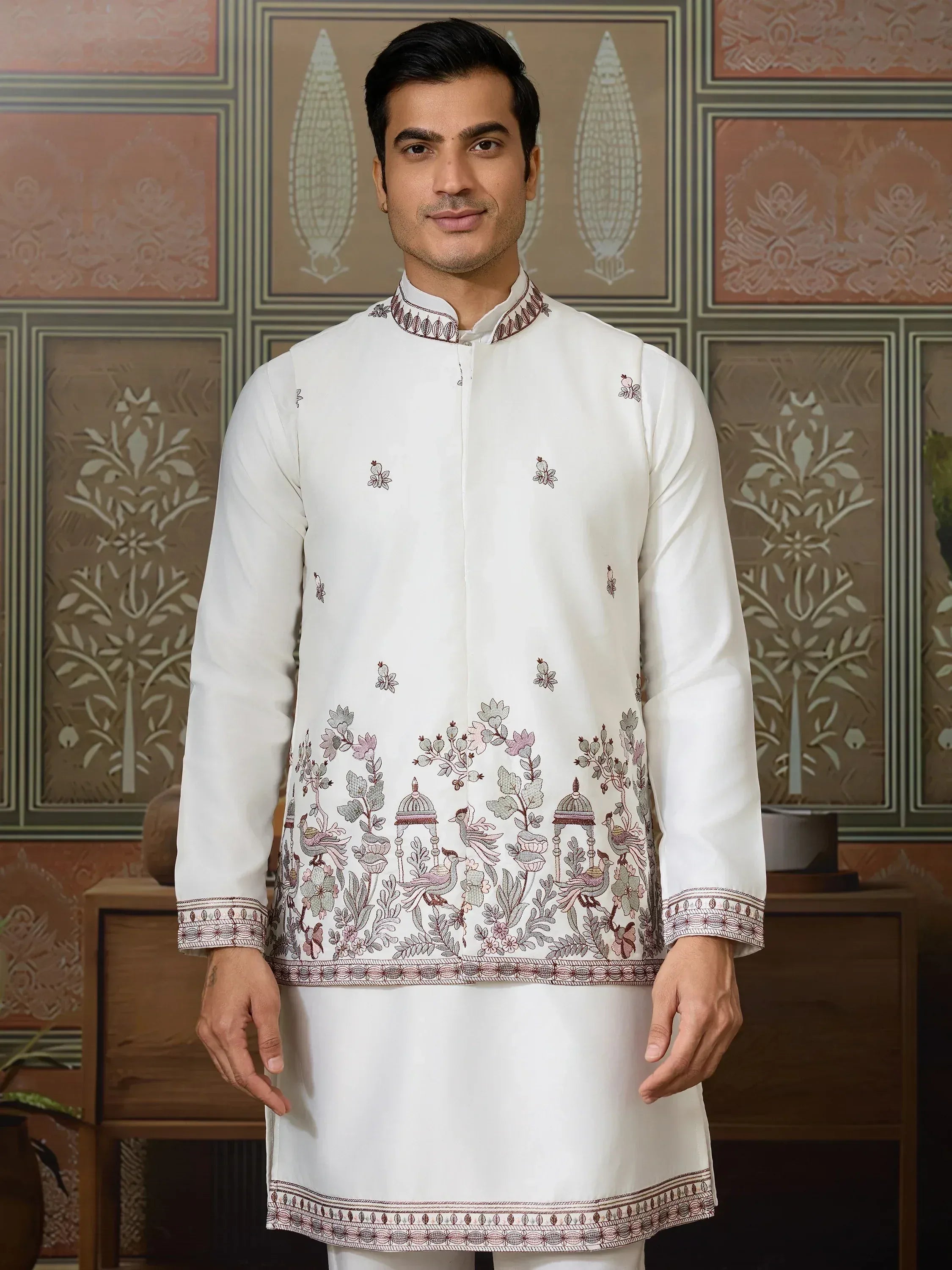 White embroidered kurta with floral and bird motifs, traditional Indian ethnic wear for men