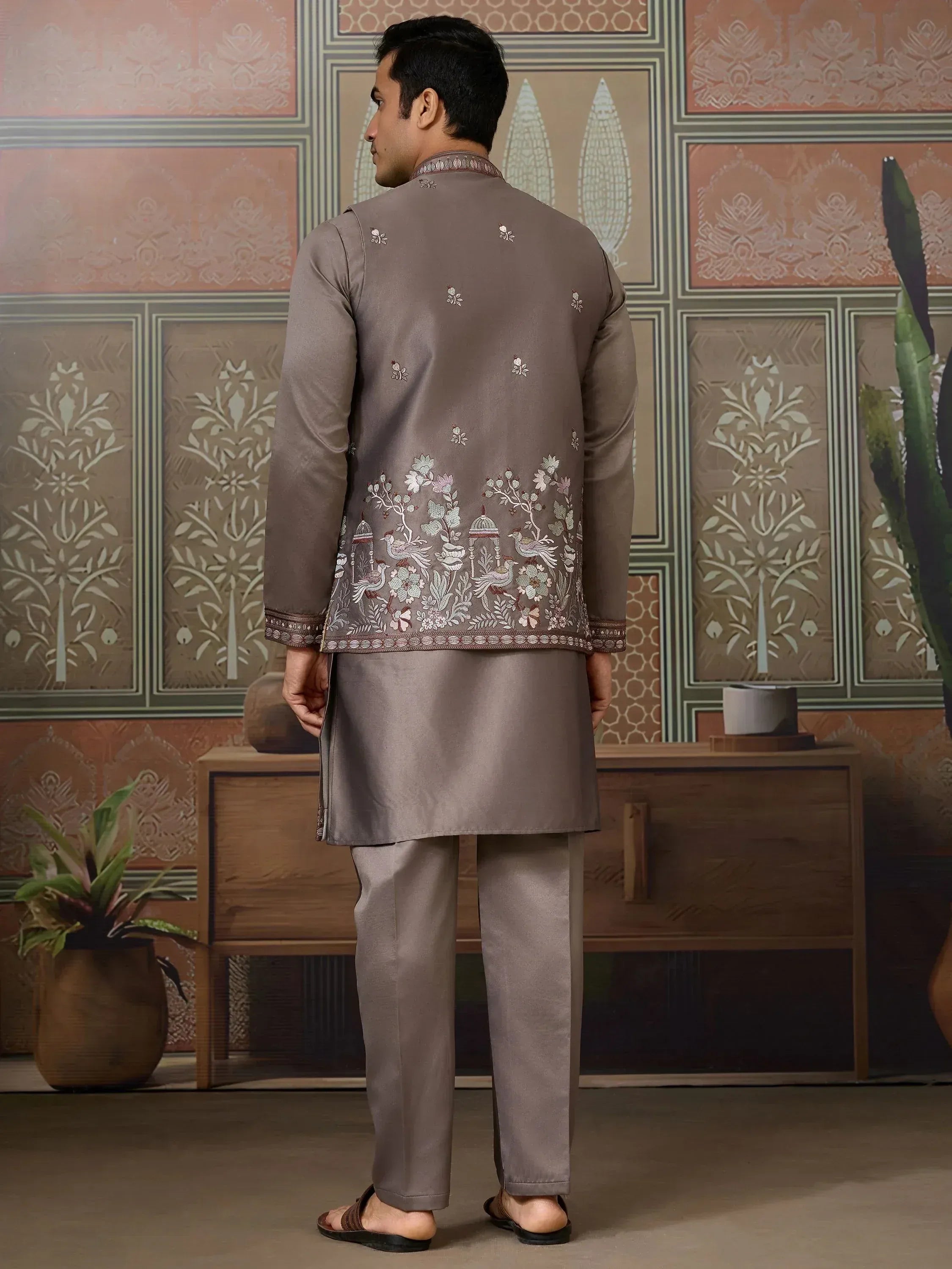 Men's grey embroidered kurta set with floral and bird motifs, perfect for Indian ethnic occasions.