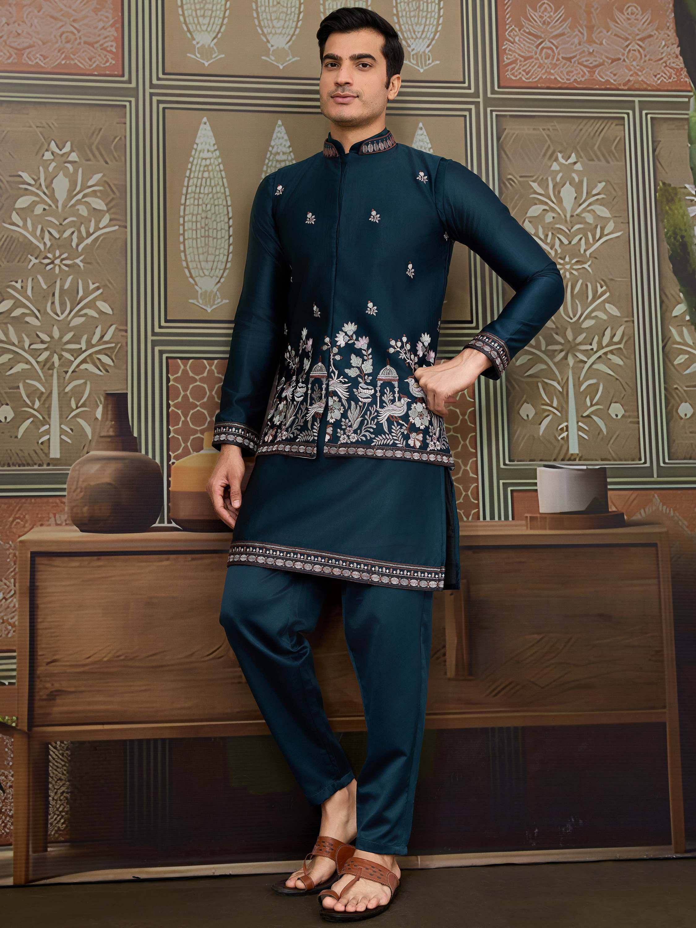 Men's dark green embroidered kurta set with floral and bird motifs, traditional Indian ethnic wear