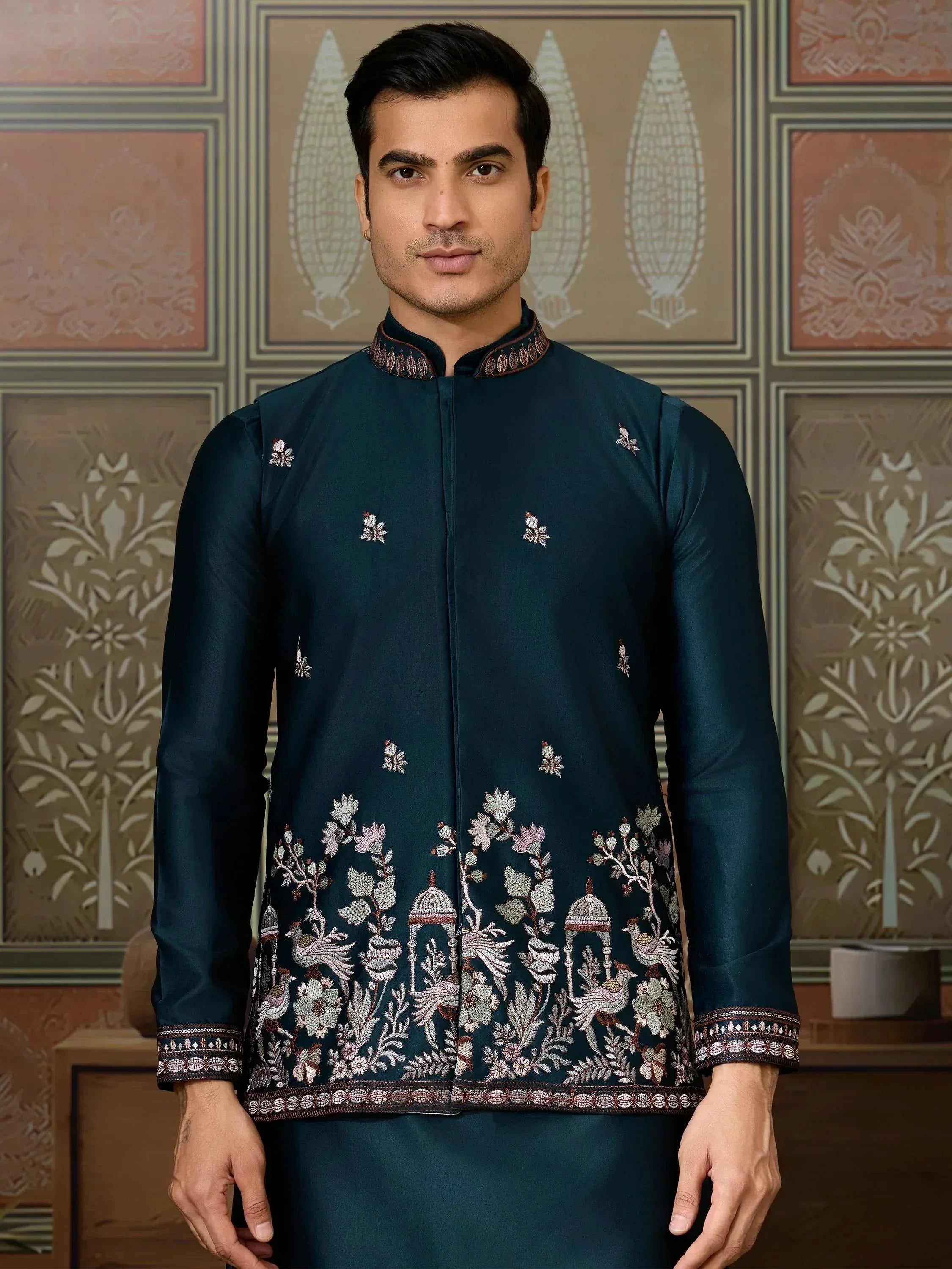 Men's dark teal embroidered kurta with floral and bird motifs, traditional Indian ethnic wear