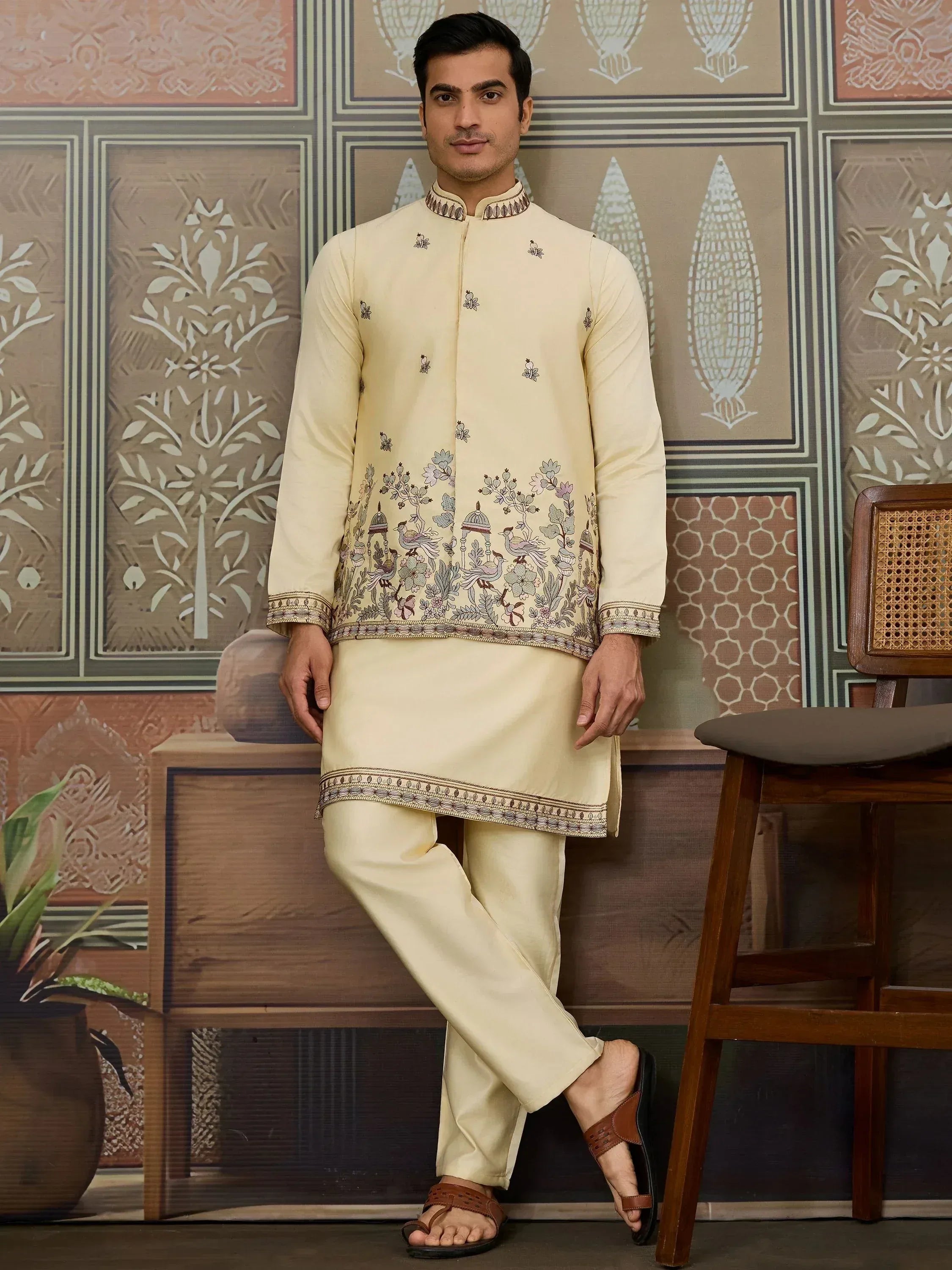 Men's cream embroidered kurta set with floral and bird motifs, ideal for Indian ethnic occasions