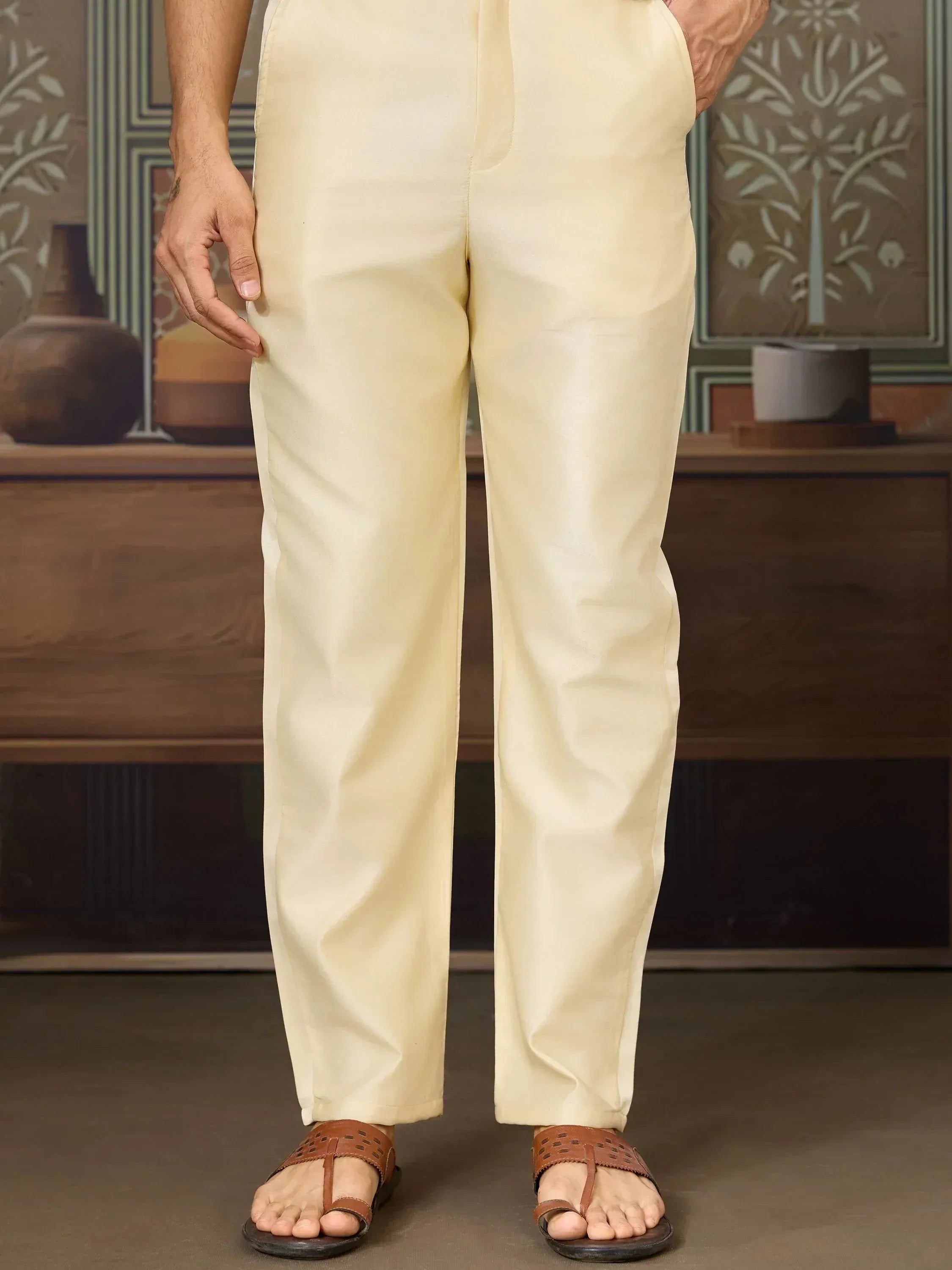 Cream silk dhoti pants for men, ethnic wear with brown sandals, traditional Indian style
