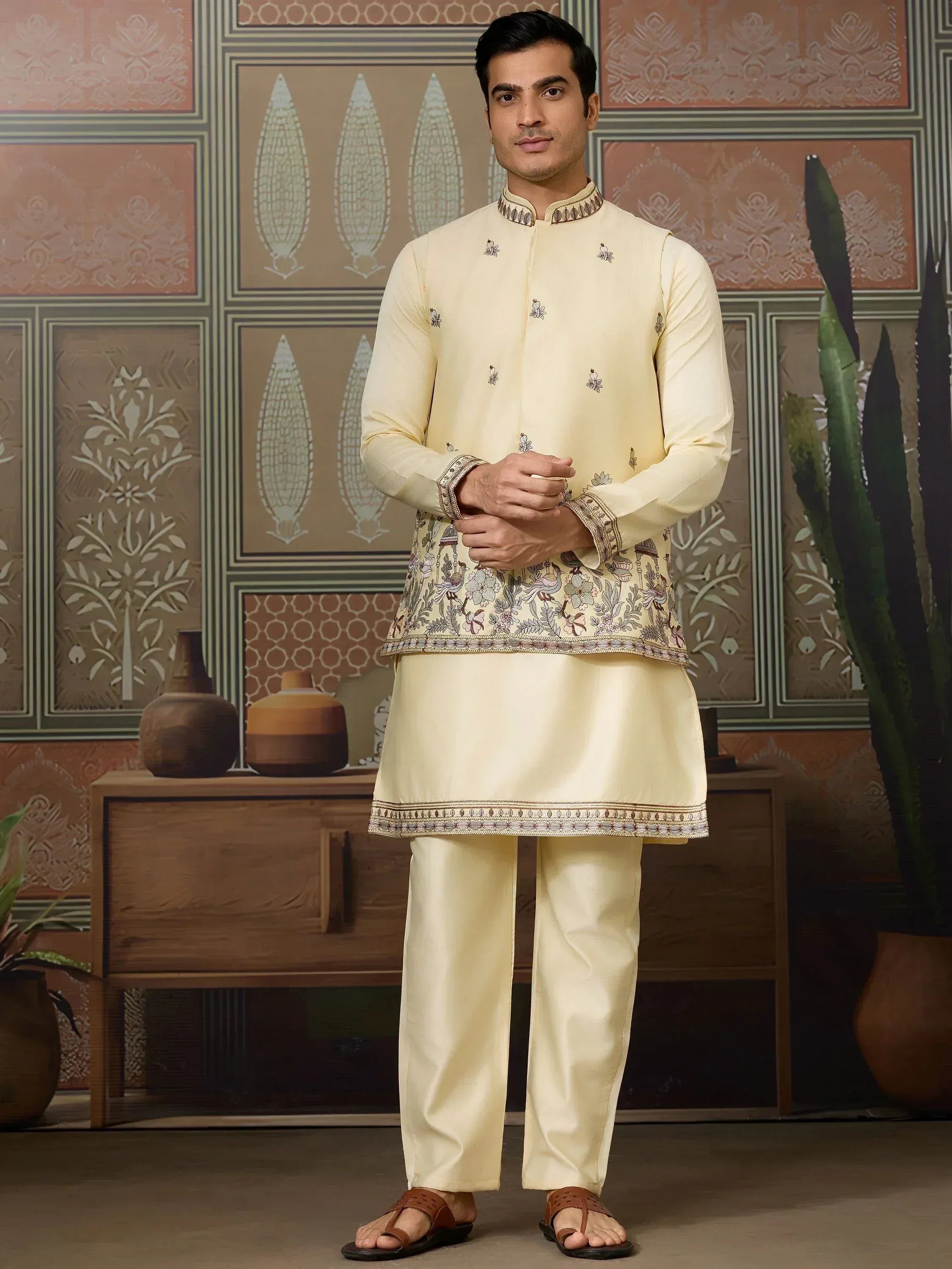 Men's cream embroidered kurta set with floral motifs, perfect for Indian ethnic occasions