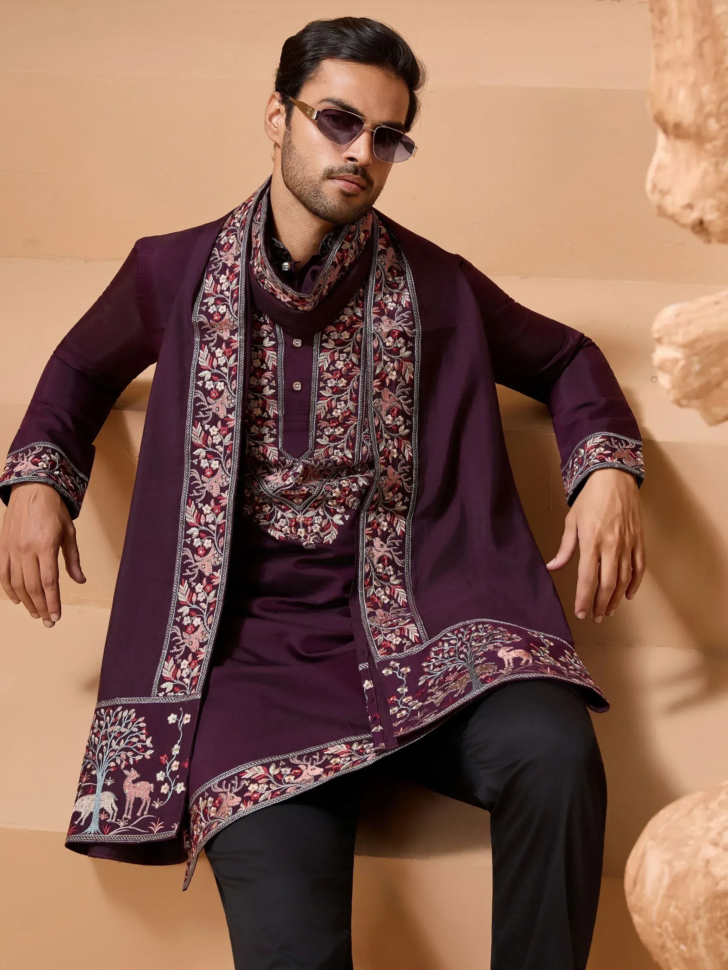 Men's purple embroidered kurta set with floral and deer motifs, perfect for ethnic occasions