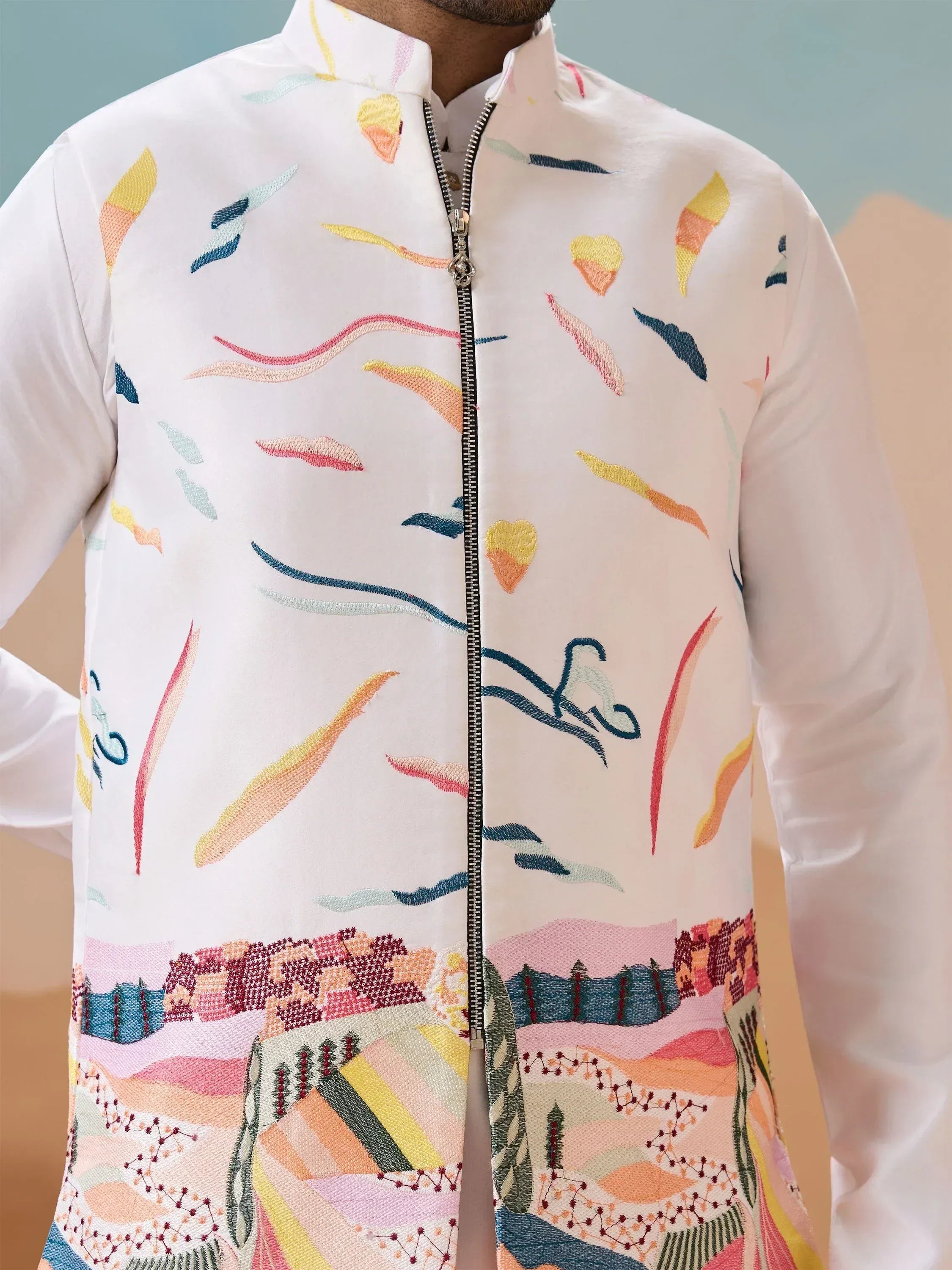 White embroidered kurta with colorful abstract patterns and front zipper, ethnic Indian wear