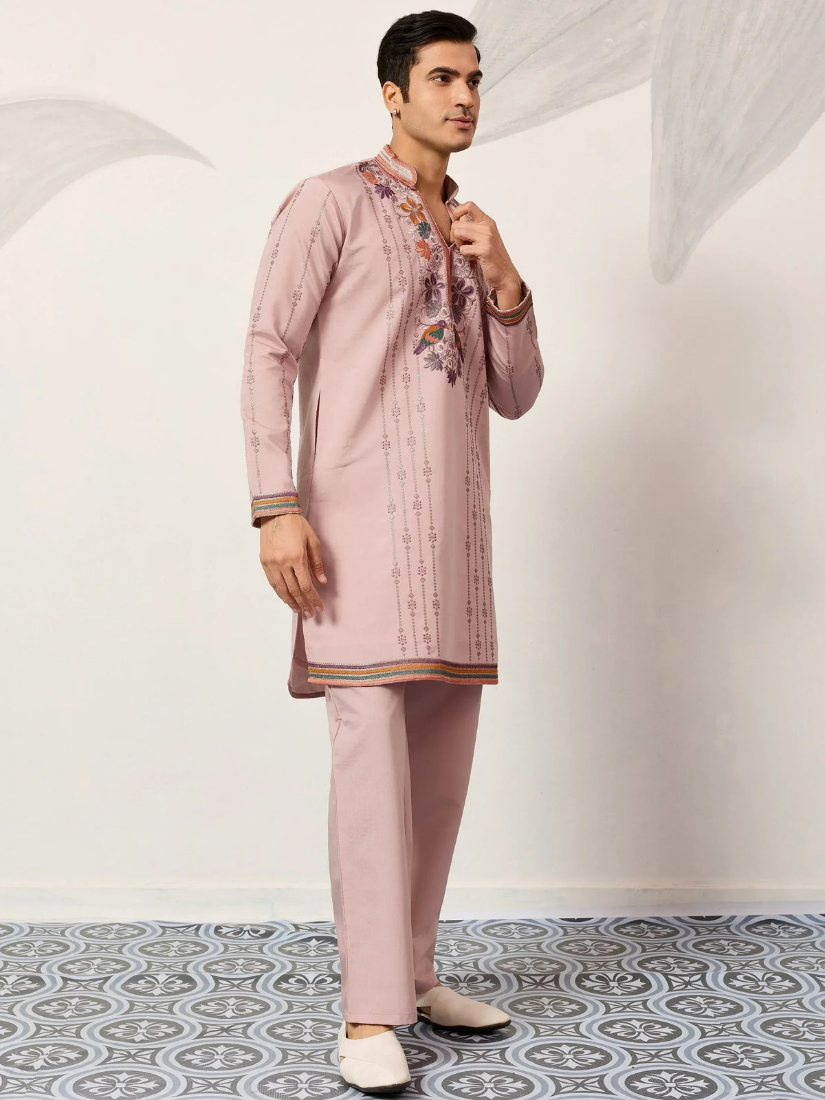 Pink embroidered kurta set with floral and bird motifs, paired with matching pants for men's ethnic wear