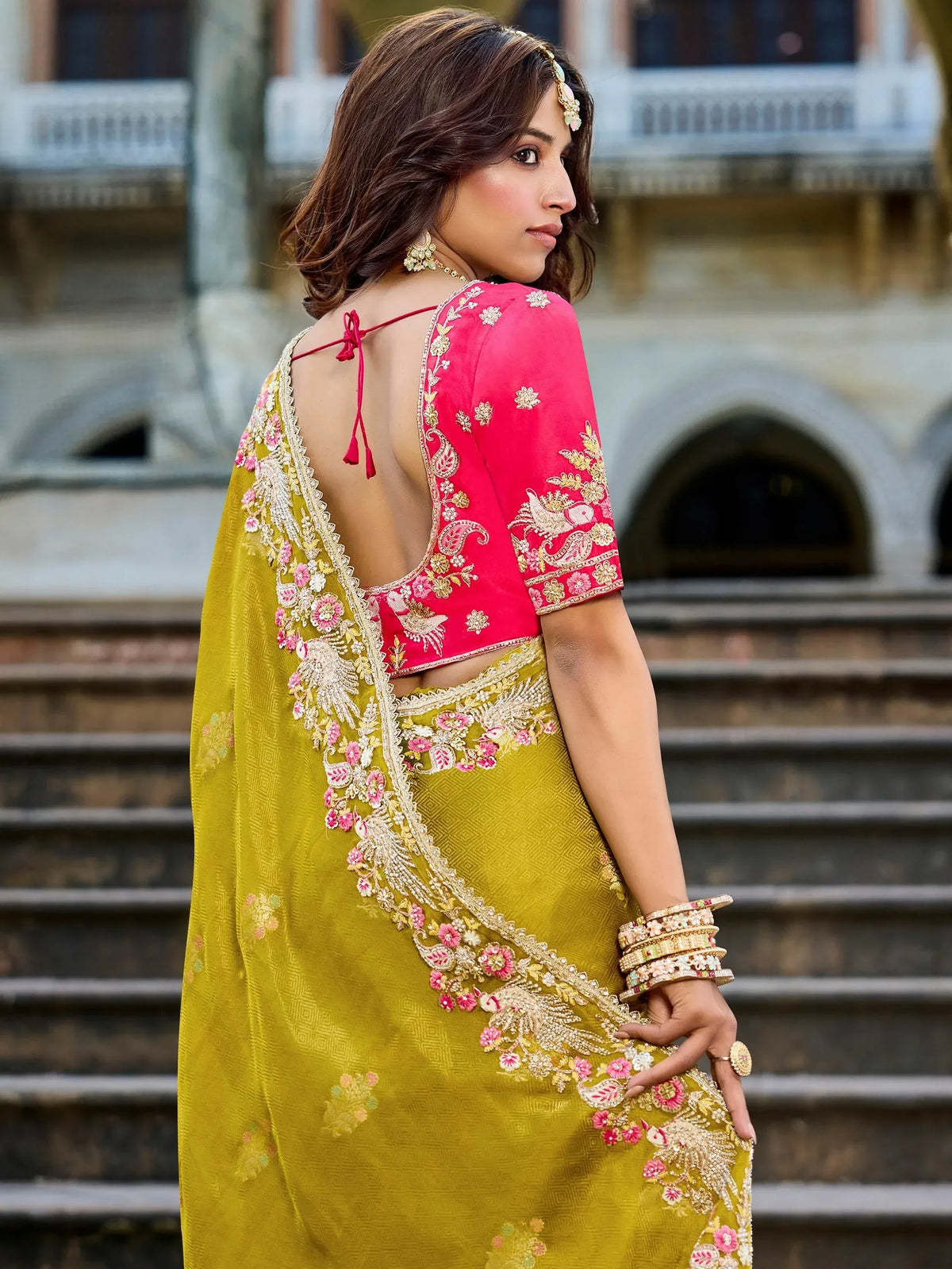 Yellow embroidered saree with pink blouse, floral zari work, backless design, Indian ethnic wear