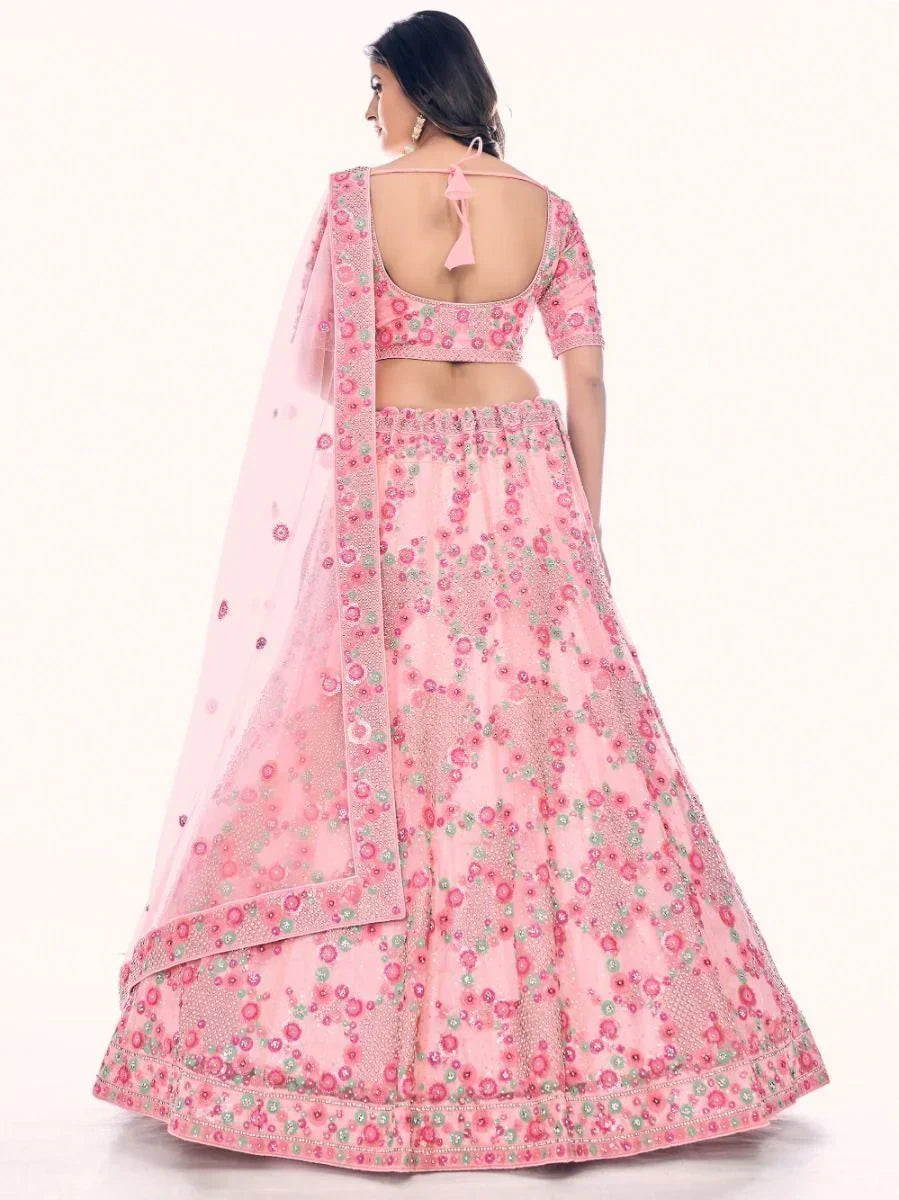 Impressive Pink Embroidered Soft Net Engagement Lehenga Choli