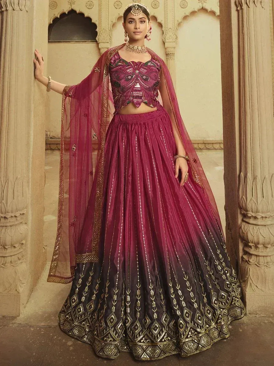 Elegant maroon and black lehenga choli with gold embroidery, perfect for Indian weddings and festive occasions.