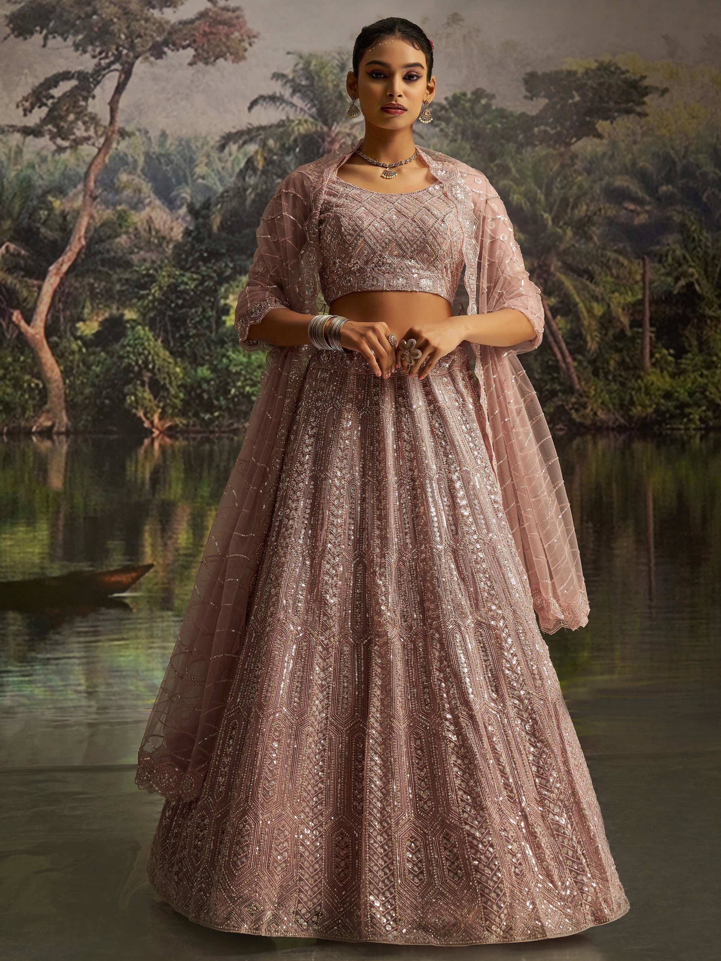 Elegant pink sequined lehenga choli with geometric embroidery, perfect for Indian ethnic wear events