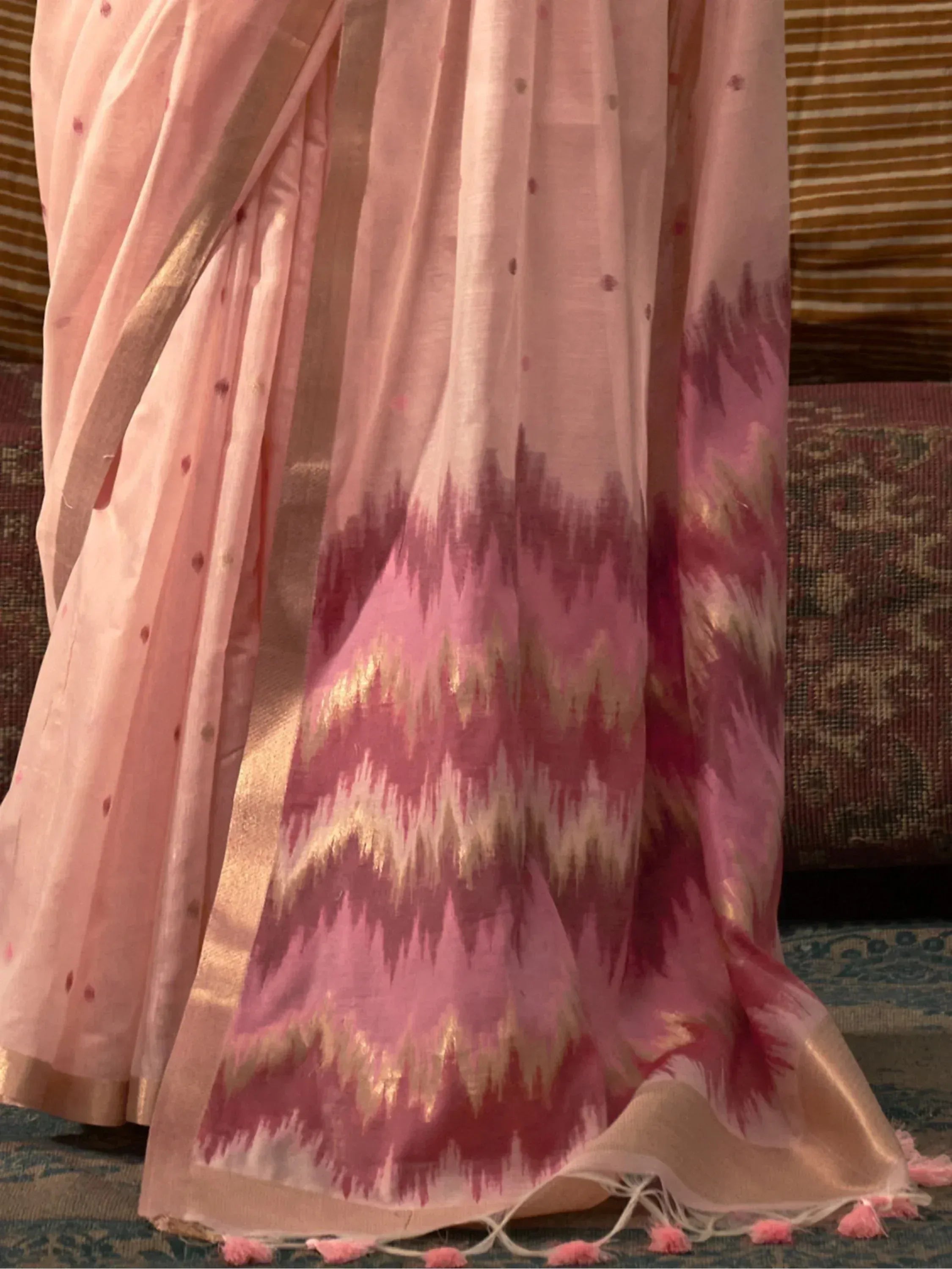 Pink ikat saree with gold zari border and tassels, ethnic Indian wear