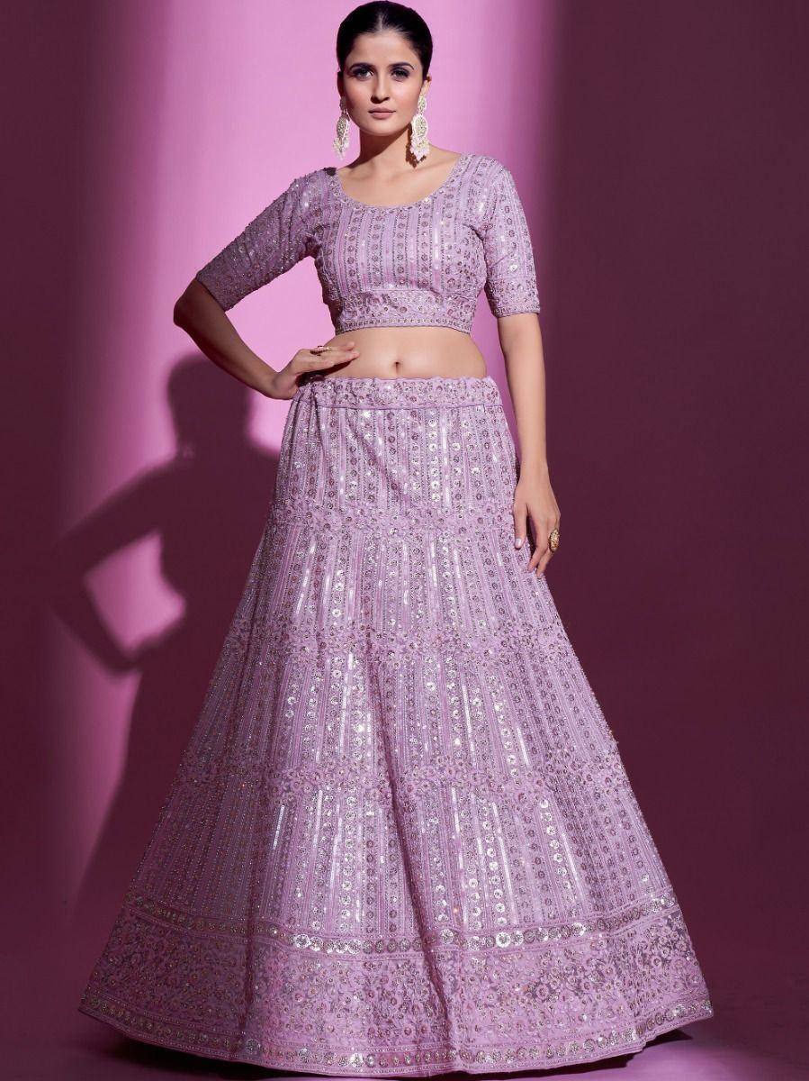 Lavender designer lehenga choli with intricate embroidery and sequins, perfect for Indian ethnic occasions