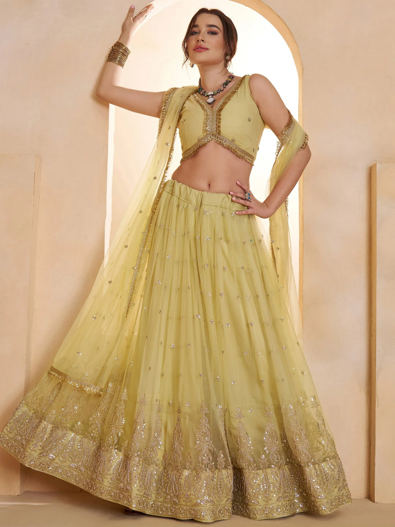 Wonderful Pastel Yellow Embroidered Net Haldi Wear Lehenga Choli
