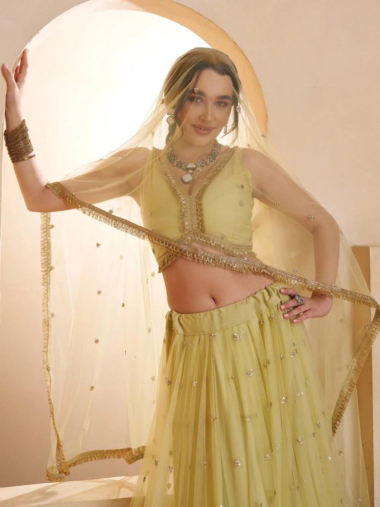 Wonderful Pastel Yellow Embroidered Net Haldi Wear Lehenga Choli