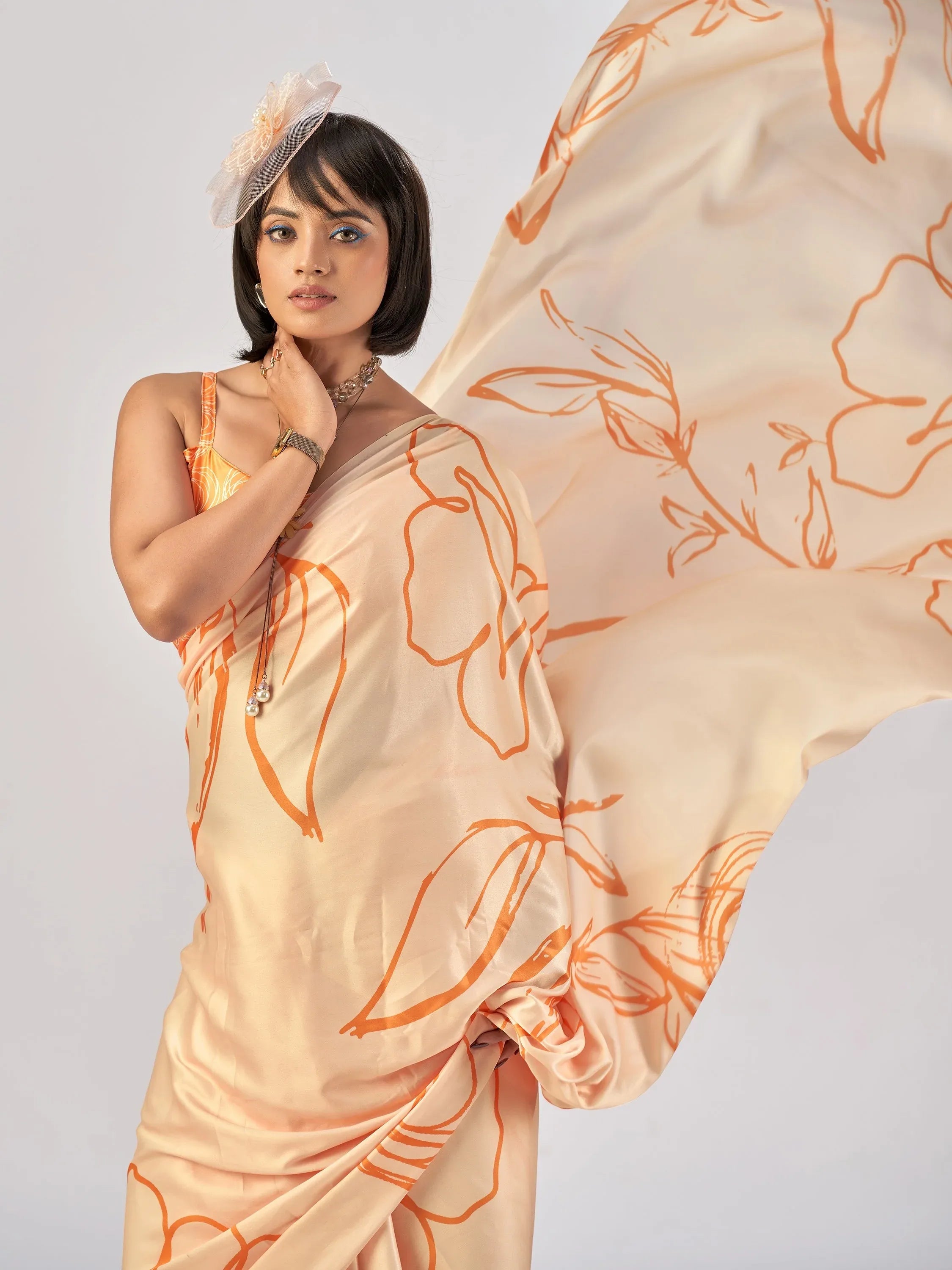 Beautiful Peach Printed Satin Casual Wear Saree With Blouse
