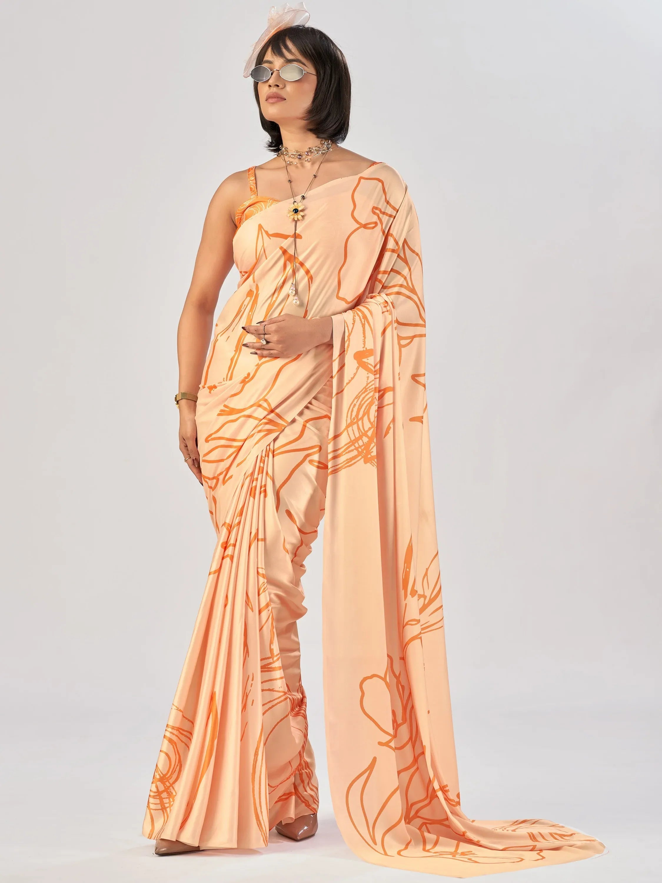 Beautiful Peach Printed Satin Casual Wear Saree With Blouse