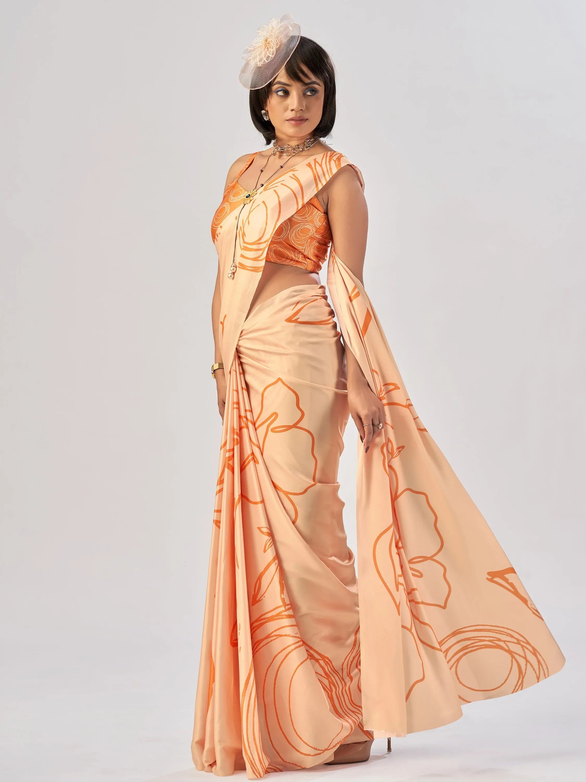 Beautiful Peach Printed Satin Casual Wear Saree With Blouse
