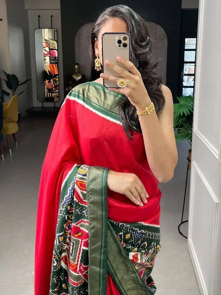 Ravishing Red Patola Printed Dola Silk Festival Wear Saree