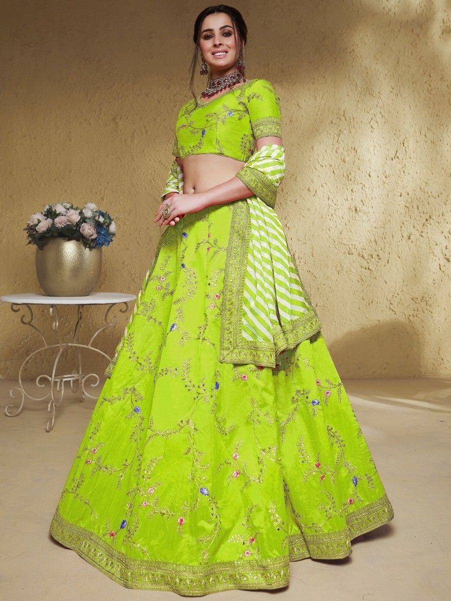 Vibrant green embroidered lehenga choli with floral motifs and striped dupatta, perfect for Indian ethnic occasions
