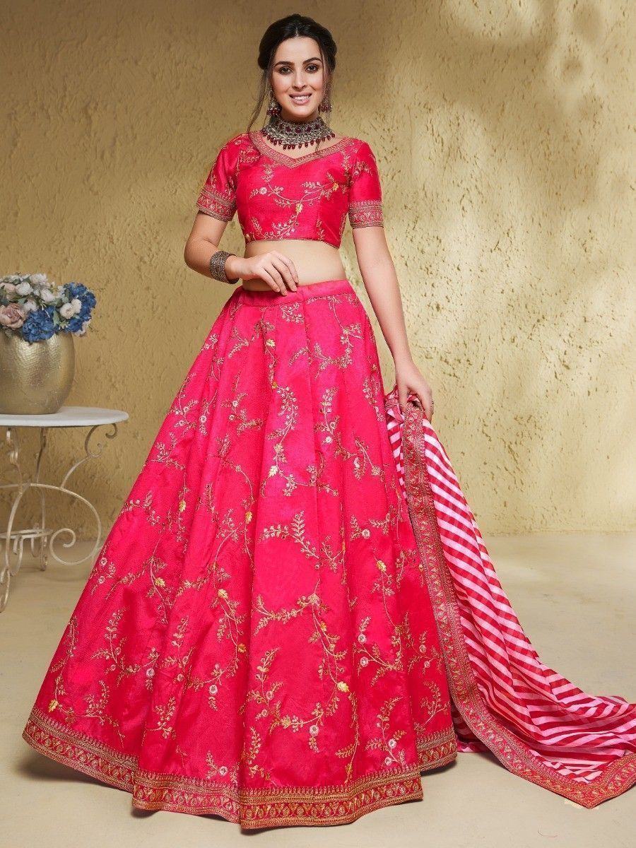 Pink embroidered lehenga choli with gold floral work and striped dupatta, ideal for Indian ethnic wear occasions