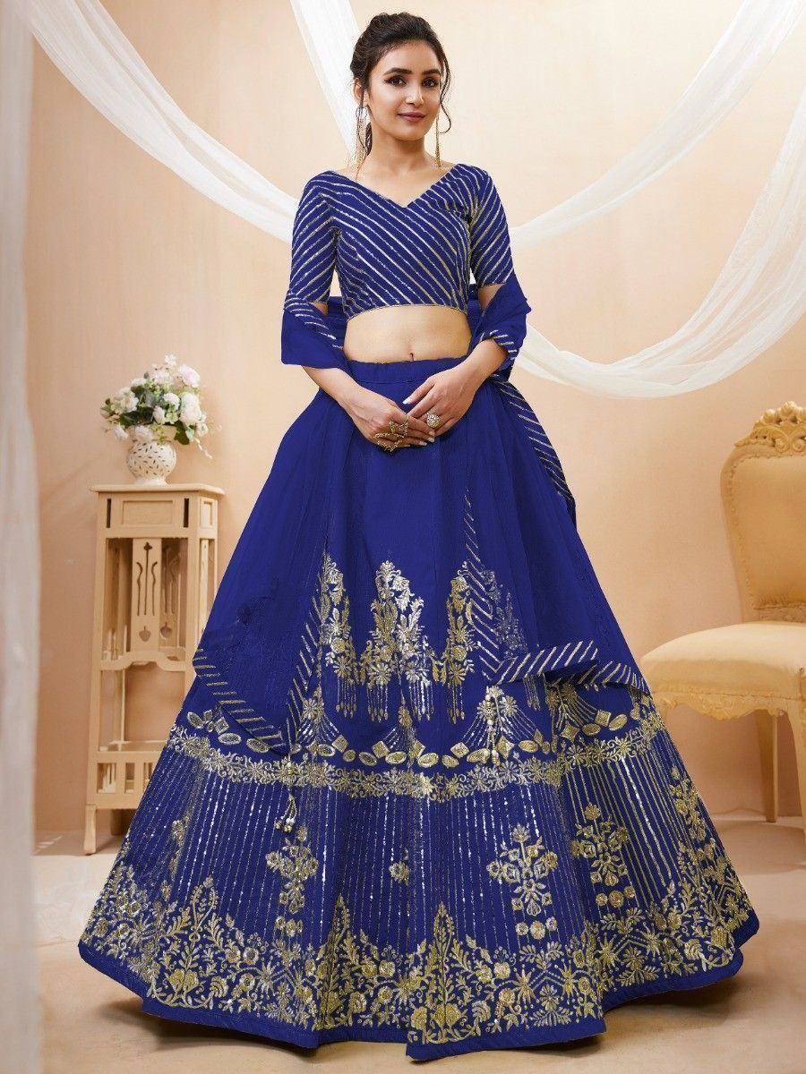 Royal blue lehenga choli with gold embroidery, perfect for Indian weddings and festive occasions