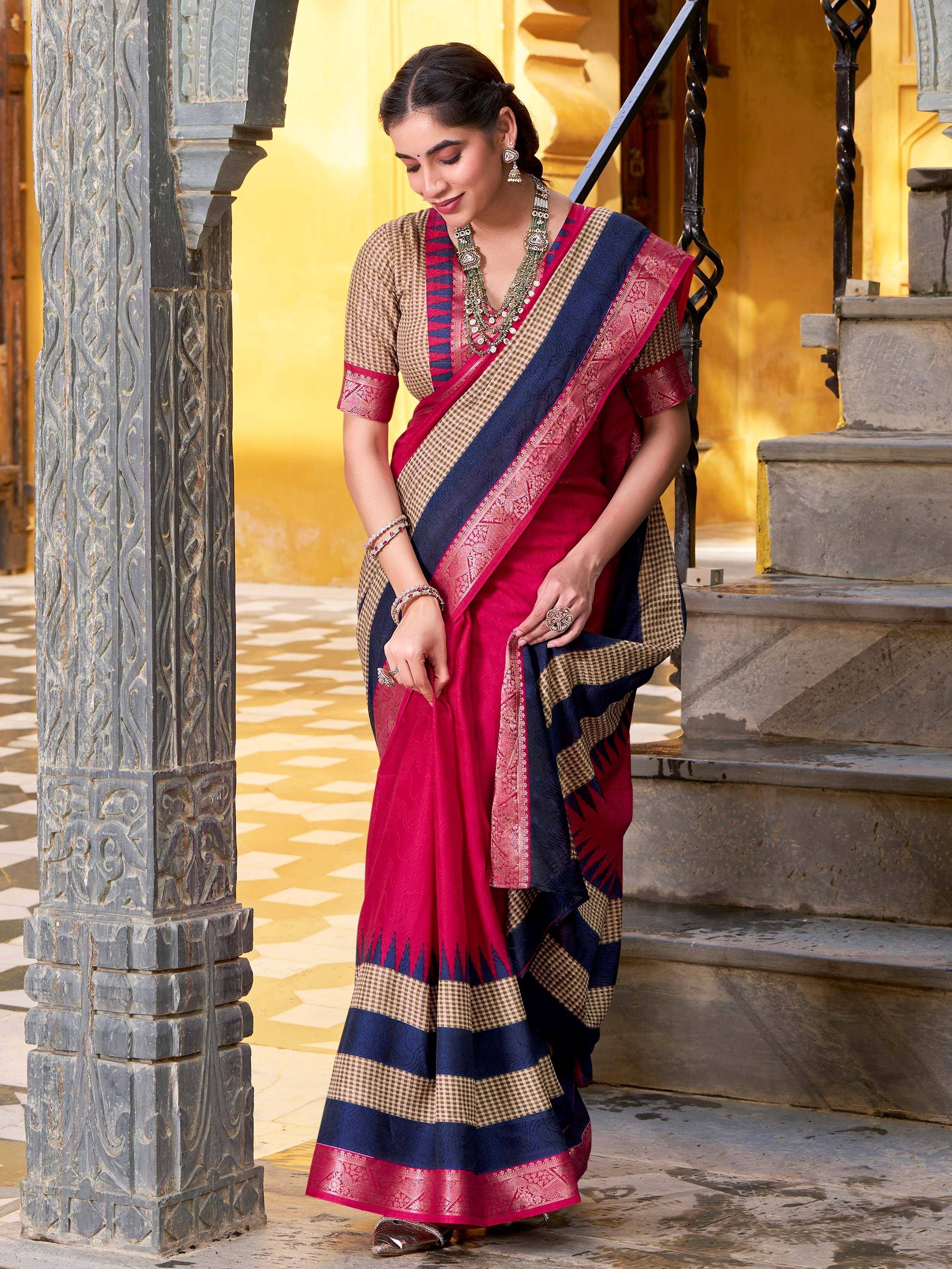 Woman in elegant red and navy blue saree with checkered blouse, traditional Indian ethnic wear