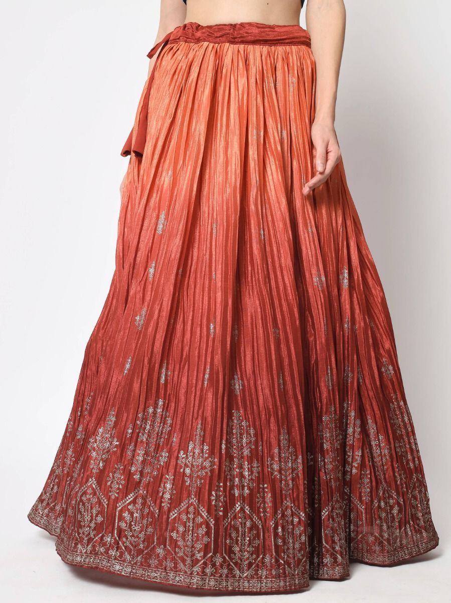Rust orange pleated lehenga skirt with silver embroidery, perfect for Indian ethnic wear