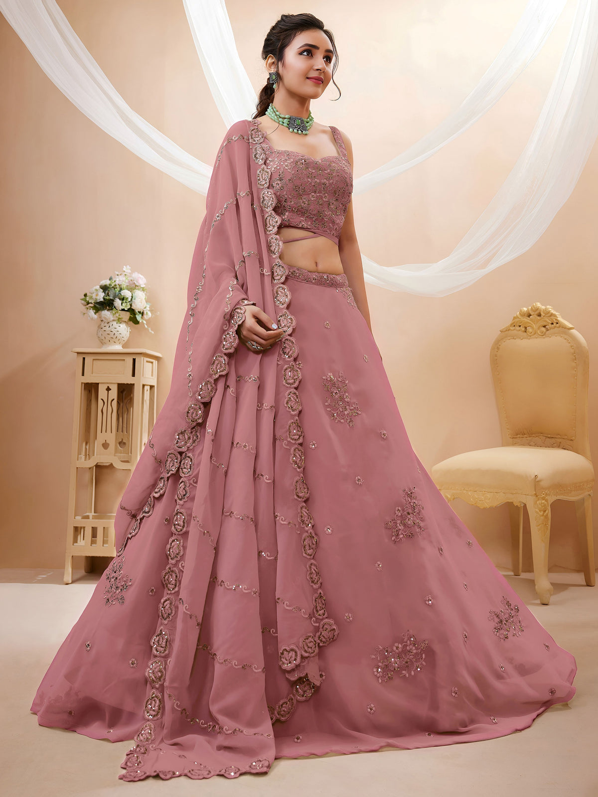 Attractive Dusty Pink Sequins Georgette Party Wear Lehenga Choli